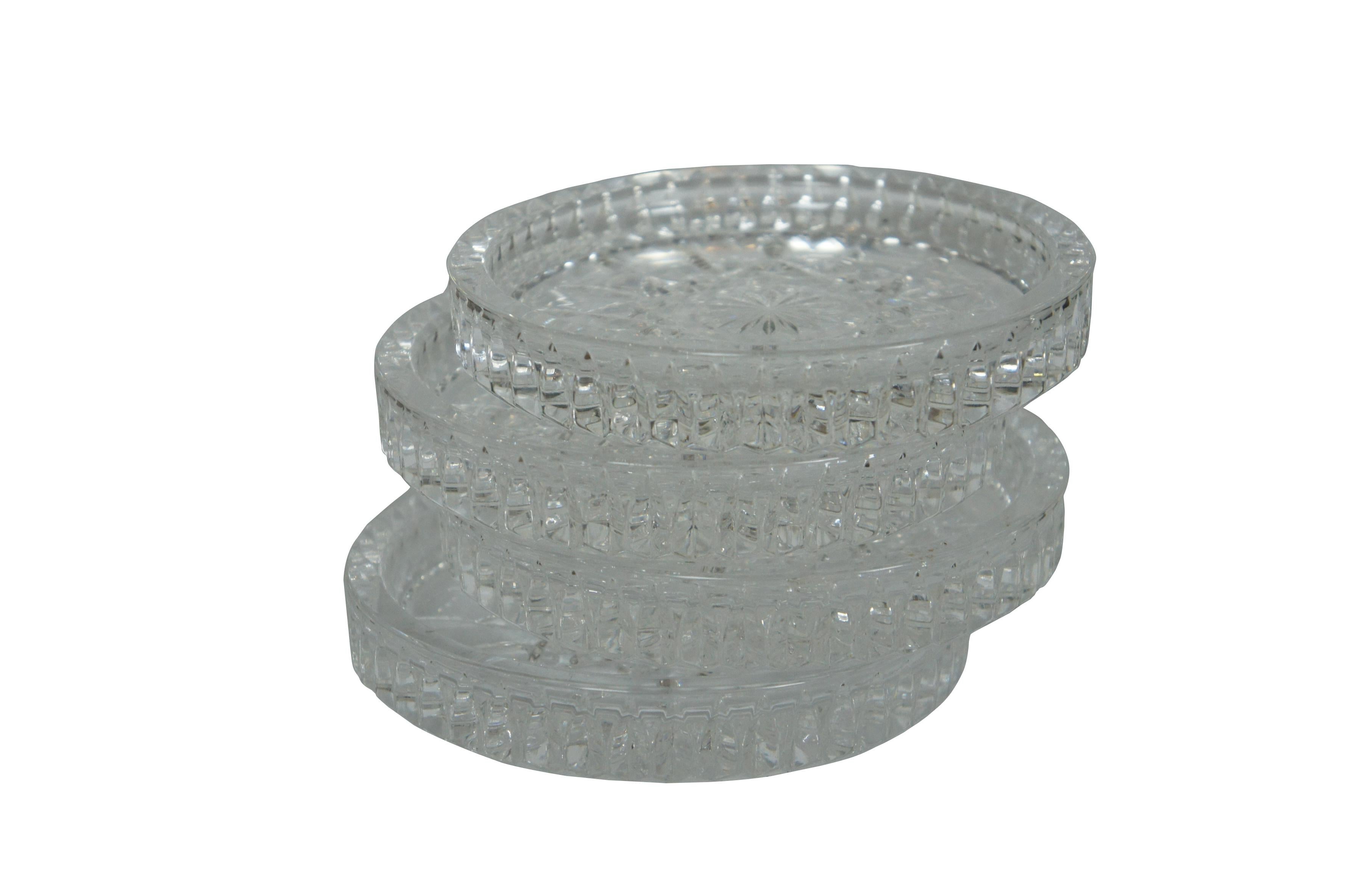 Set of 4 rare late Lismore pattern short wine bottle coaters by Waterford Crystal. Features a star shaped medallion in the center based on the Lismore design and a low wedge cut edge. Marked on base. 156499 .  Made in Germany

Dimensions:
4.75