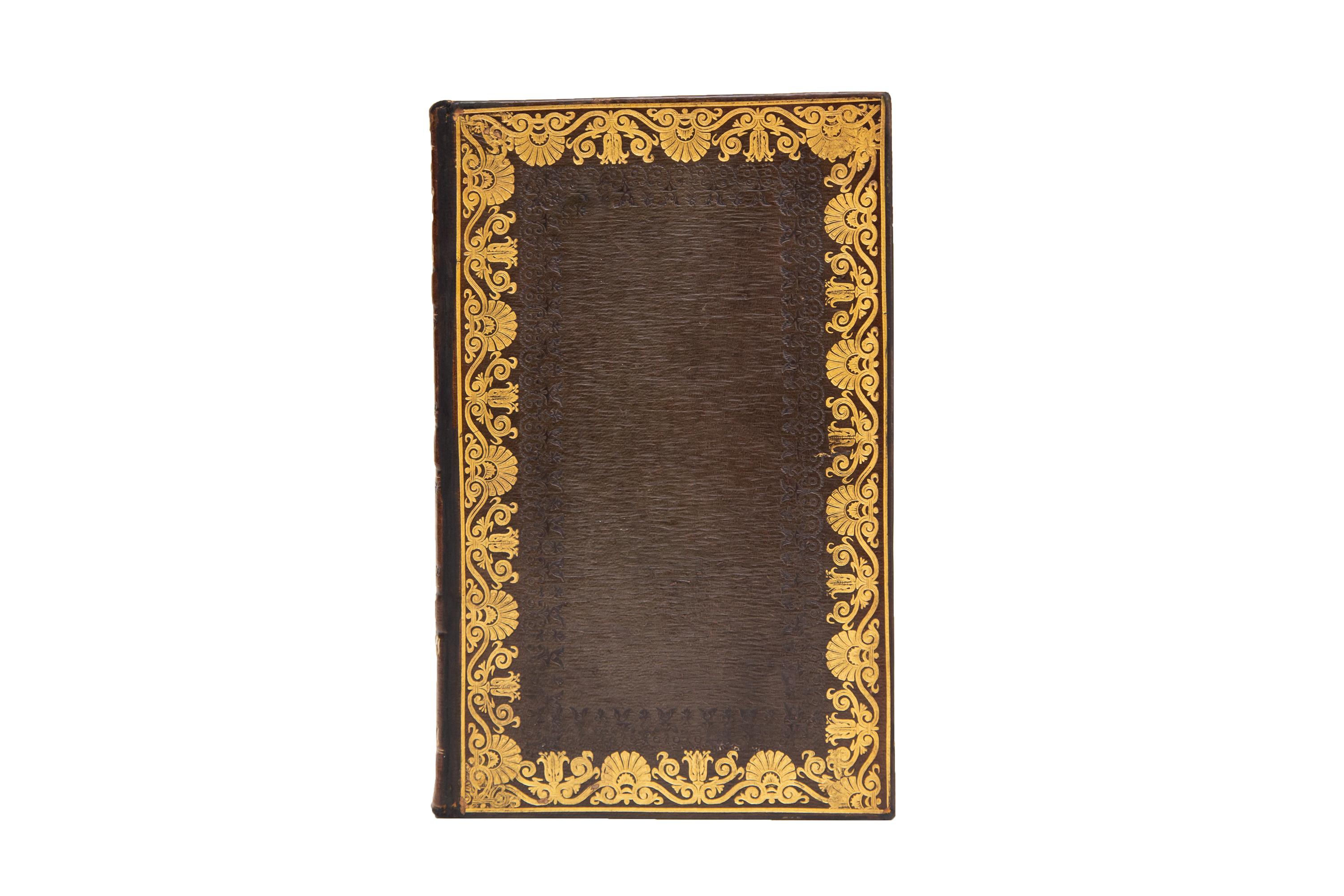 4 Volumes. Cervantes, Don Quixote. Bound in full brown morocco with the covers displaying ornate floral gilt and open tooling. Raised bands, ornately gilt-tooled with panels displaying a knight's armor, floral detailing, and label lettering in gilt