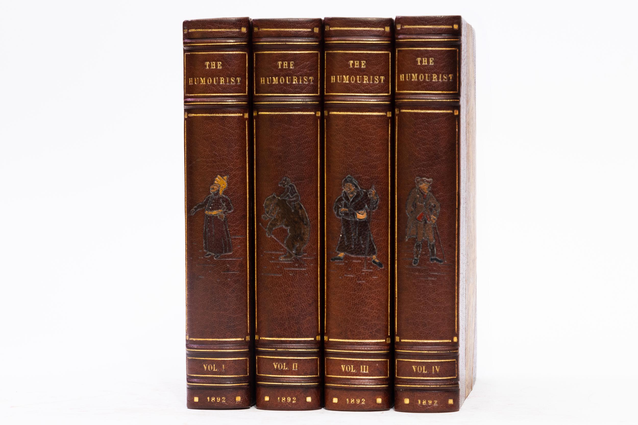 4 Volumes. George Cruikshank, The Humourist. Bound in 3/4 brown morocco. Marbled boards. Raised bands. Multi-colored inlay on spines. Top edges gilt. Marbled endpapers. Only 70 copies of this edition printed, and are issued with the 40 illustrations