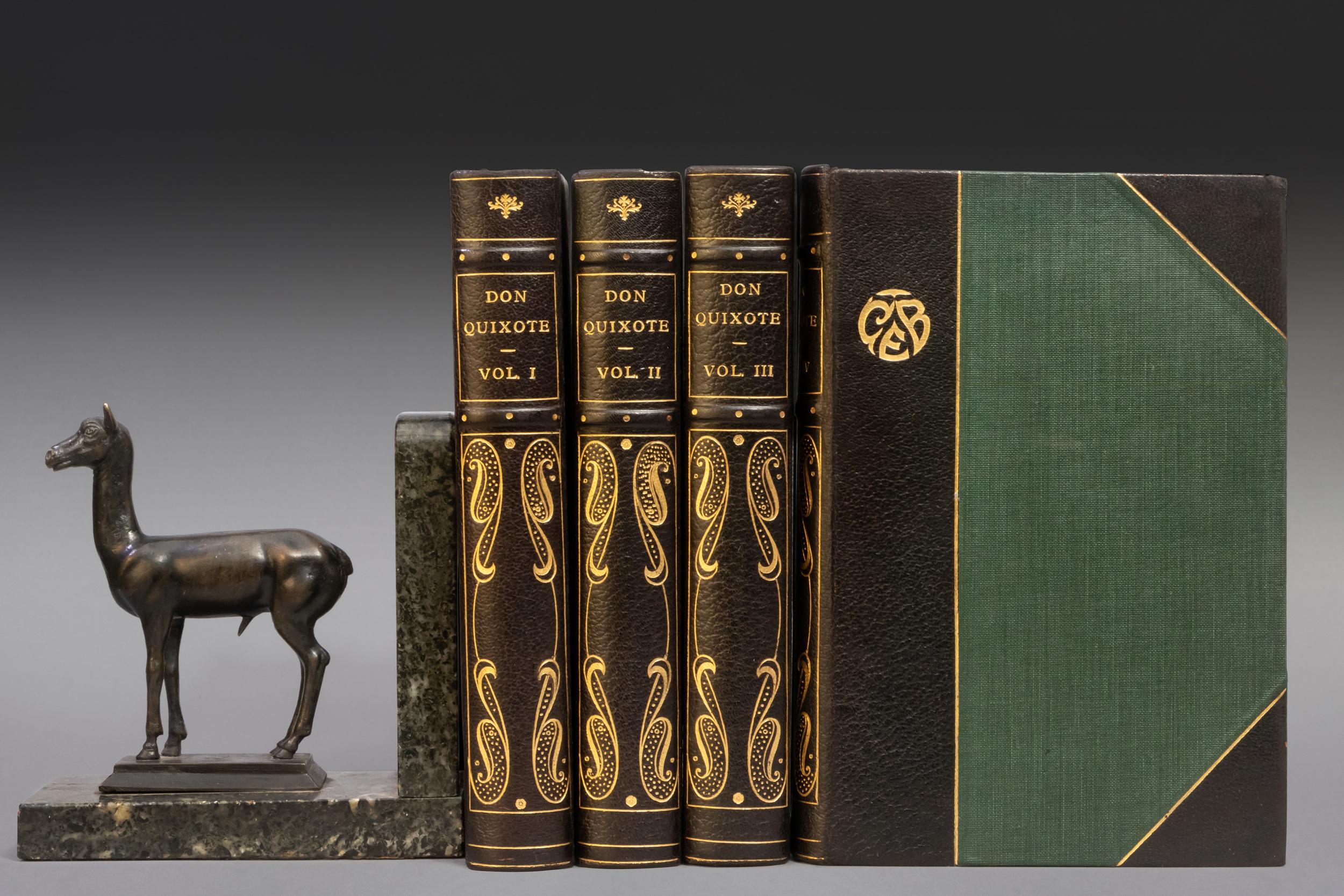 4 Volumes. P.A. Motteux. The History of the Ingenious Gentleman Don Quixote of La Mancha. Bound in 3/4 black morocco. Top edges gilt. Raised bands. Gilt emblem on cover. Gilt tooling on spine. Marbled endpapers. Published: New York; Charles C.