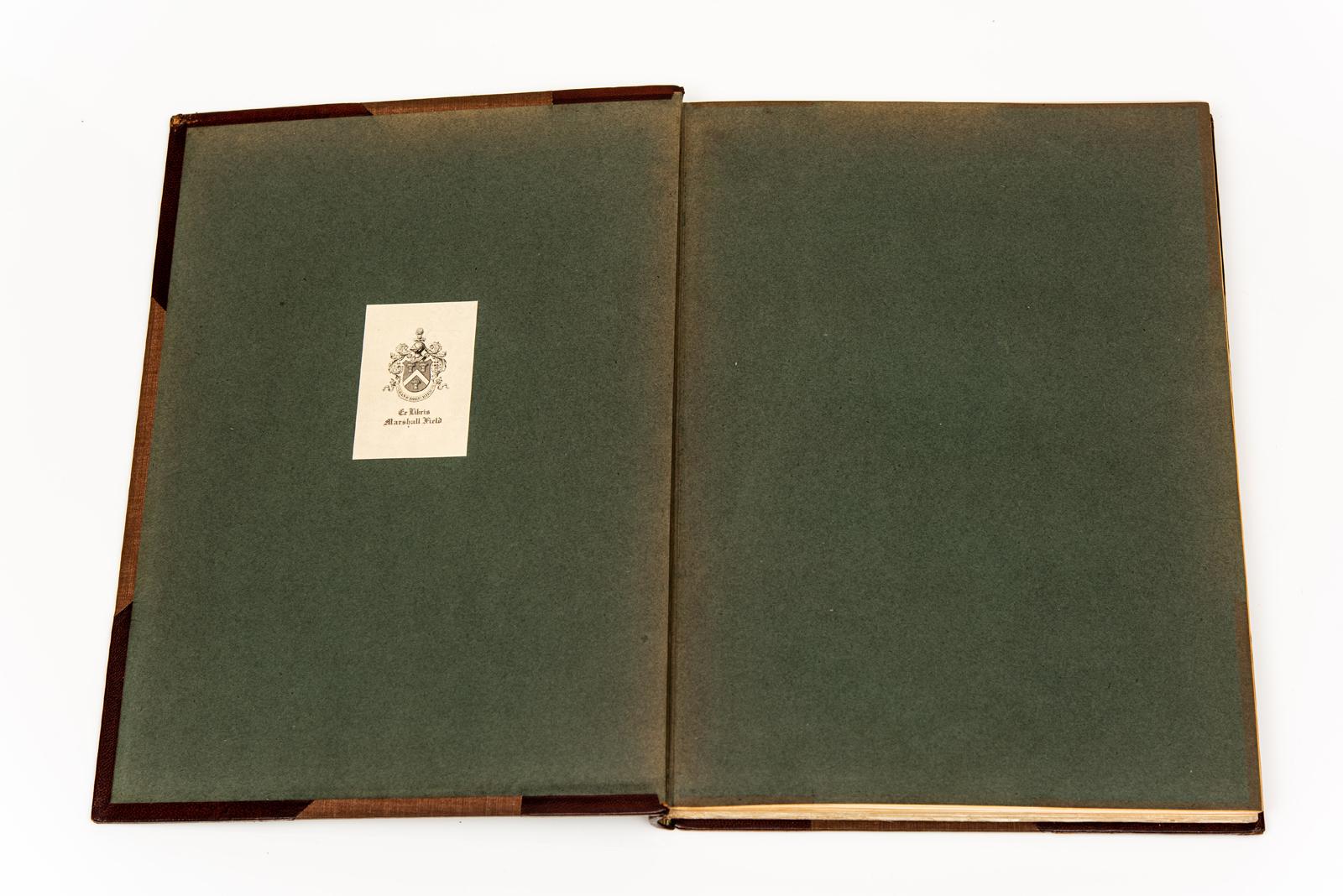 4 Volumes. Percy Macquod. A History of English Furniture. Bound in 3/4 brown morocco with linen boards. Covers and raised band spines are gilt-tooled. Top edges gilt. Color plate frontispiece with colored plates, illustrations, and etchings