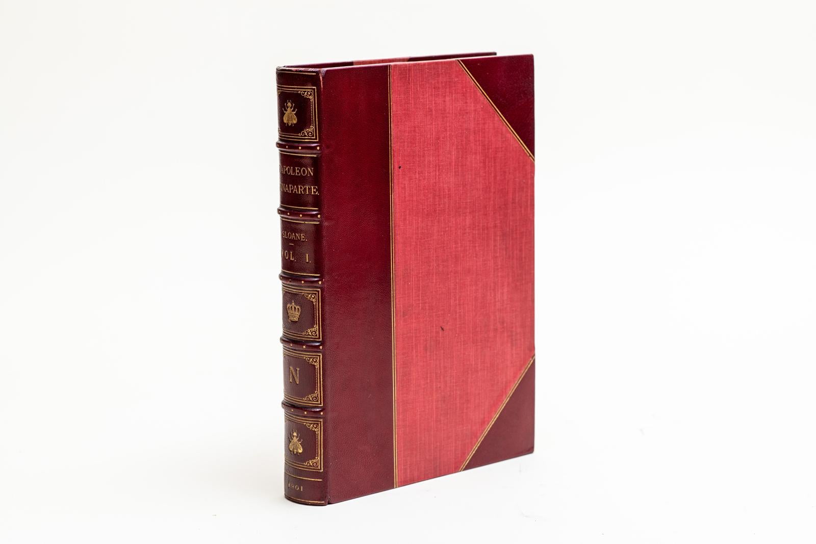 4 Volumes. William Milligan Sloane, Life of Napoleon Bonaparte. Bound by Worsfold in 3/4 red morocco and linen boards with the cover and raised band spines displaying gilt-tooled detailing. The top edges are gilt with marbled endpapers. There are