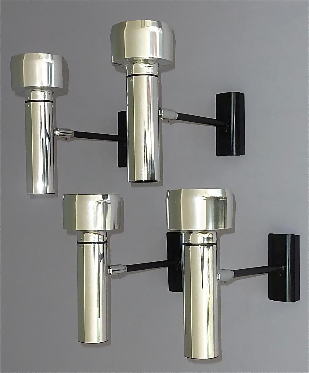 Cool Space Age set of four Gino Sarfatti for Arteluce Style wall lights, sconces, ceiling lights, spots / lamps made by Erco, Germany, circa 1970s. The multifunctional high quality set is made of polished aluminum, black enameled chrome metal and