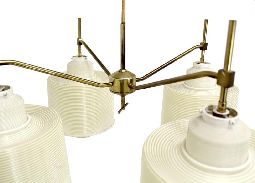 Circa 1950s mid-century modern adjustable light fixture. The fixture comes with the track whit it is mounted to and can be repositioned as needed from side to side. Dimensions do not include the cord.