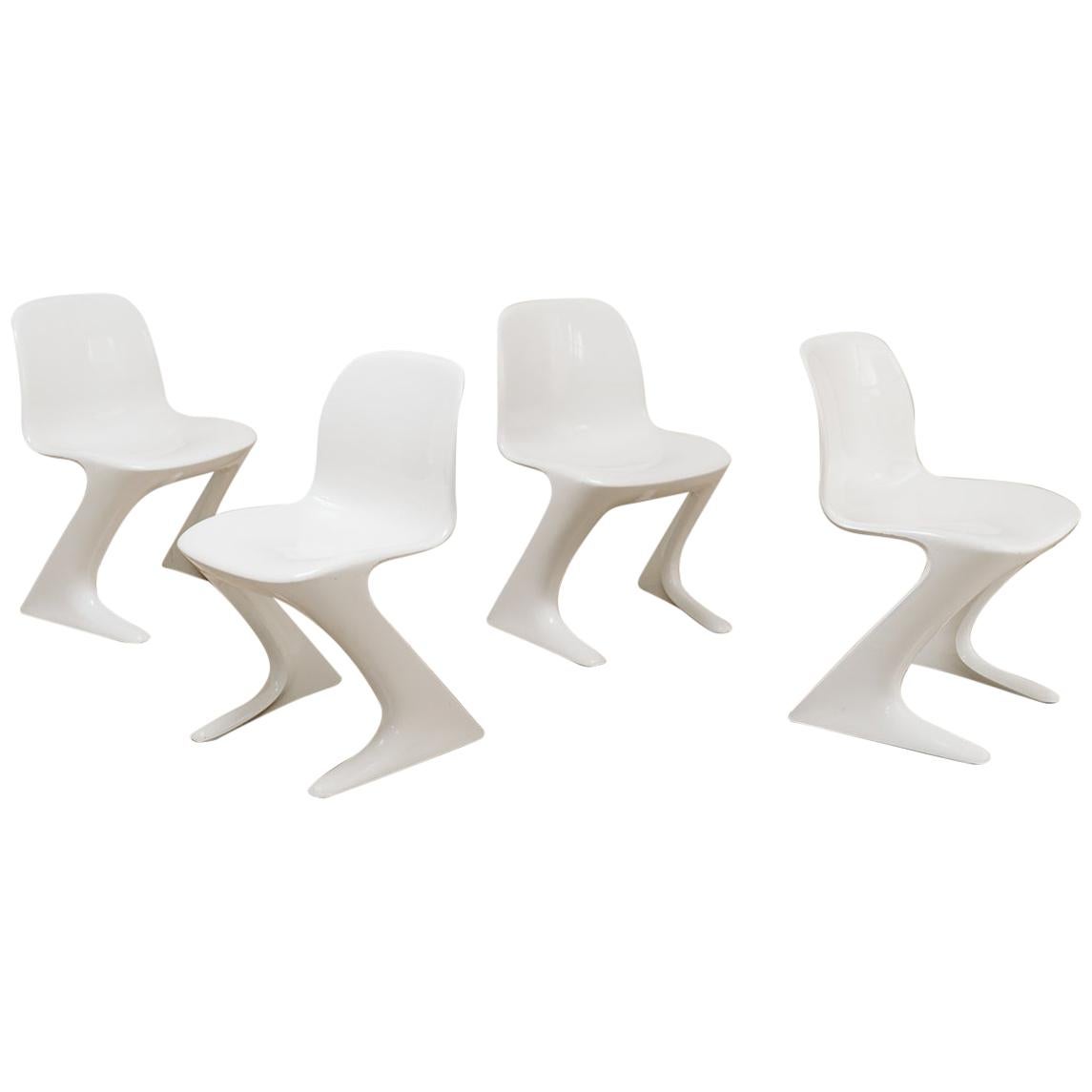 4 White Kangaroo Chairs by Ernst Moeckl