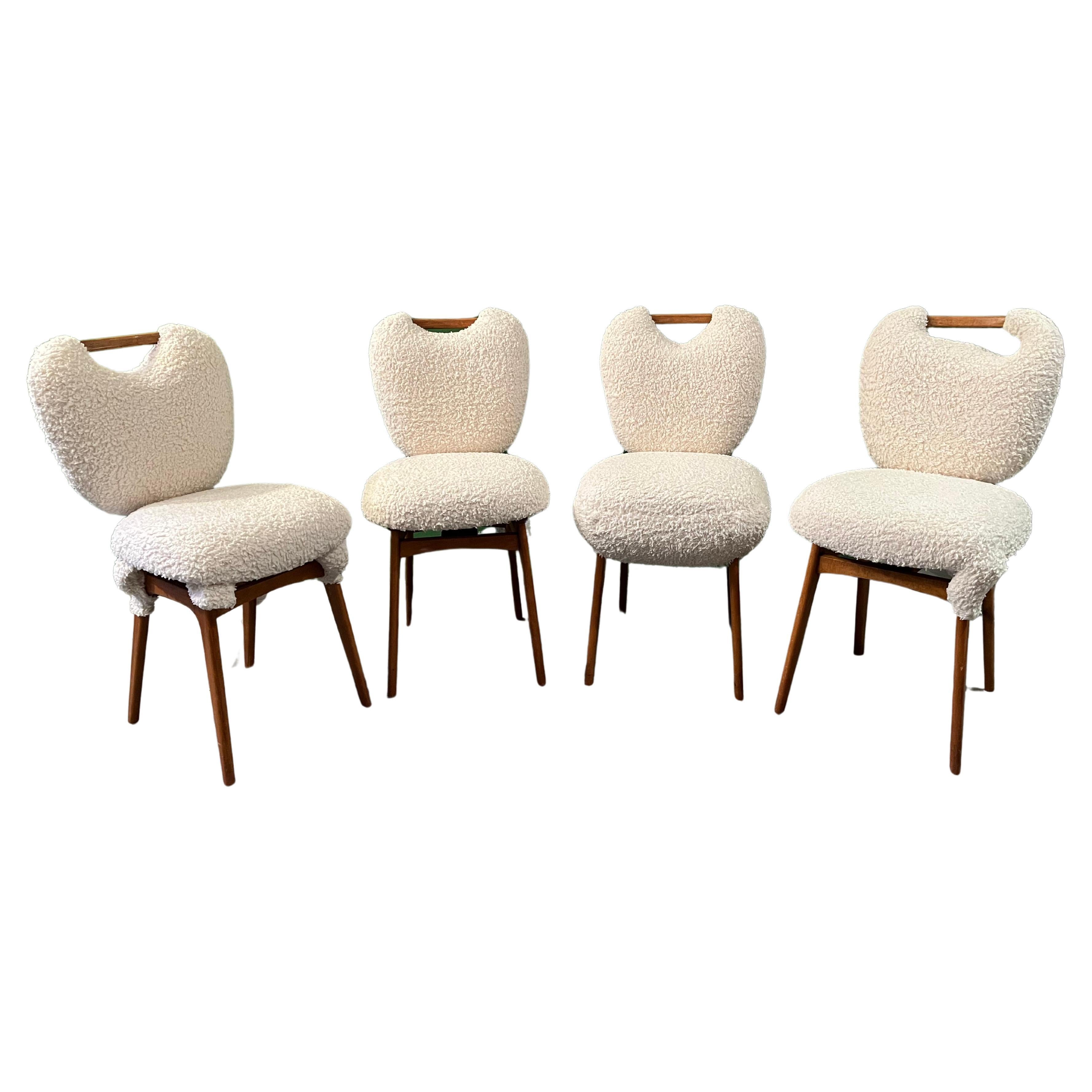 The 4 Bio-teddy/lamb-teddy dining room chair are all different. Upholstered in thick teddy, alterations made, very comforfortable. The idea was to give a traditional design a super contemporary style, make them one of a kind functional design