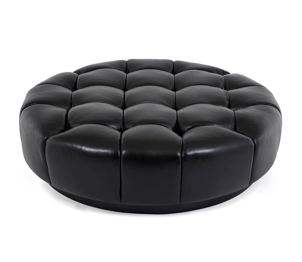 Bubbly and delicious, the hand-tufted 4 x 4 Round Ottoman beautifully shapes any space. The delicate crown of each tuft is fun, flirty, and begs to be sat on.