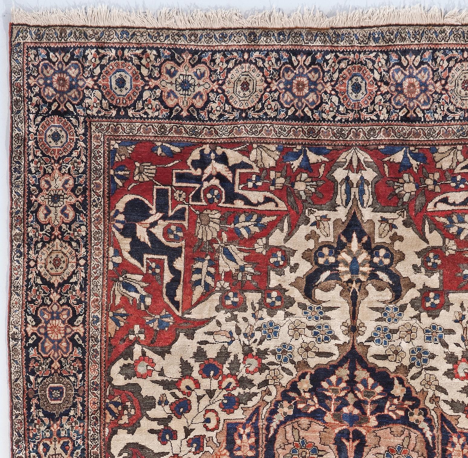 An antique Sarouk Farahan rug is a captivating and highly sought-after textile masterpiece that showcases the rich artistic heritage of the Sarouk Farahan. Handcrafted with exceptional skill and meticulous attention to detail, these rugs are