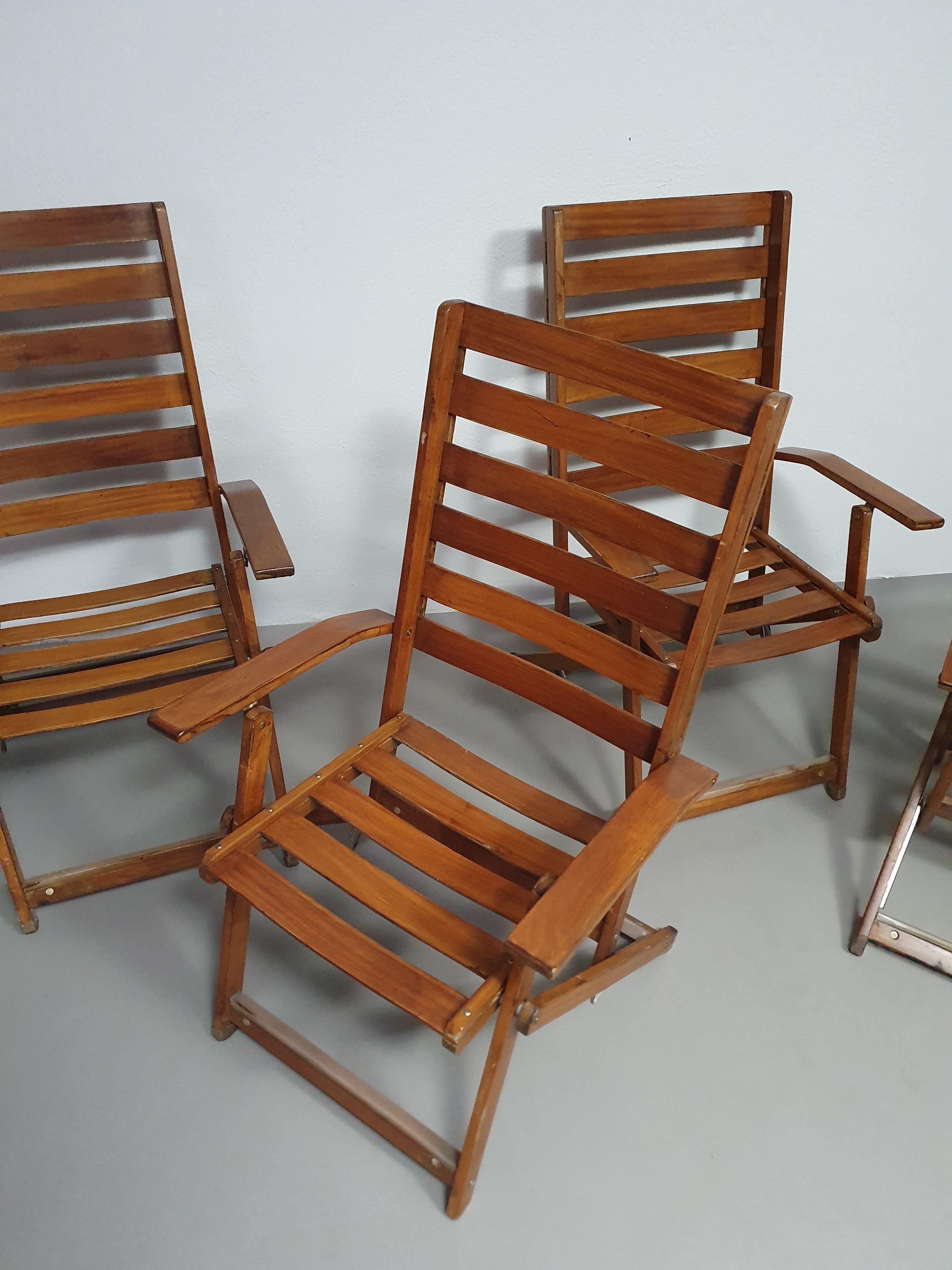 Art Deco 4 x Reclining and folding armchairs / table manufactured by Fratelli Reguitti  For Sale