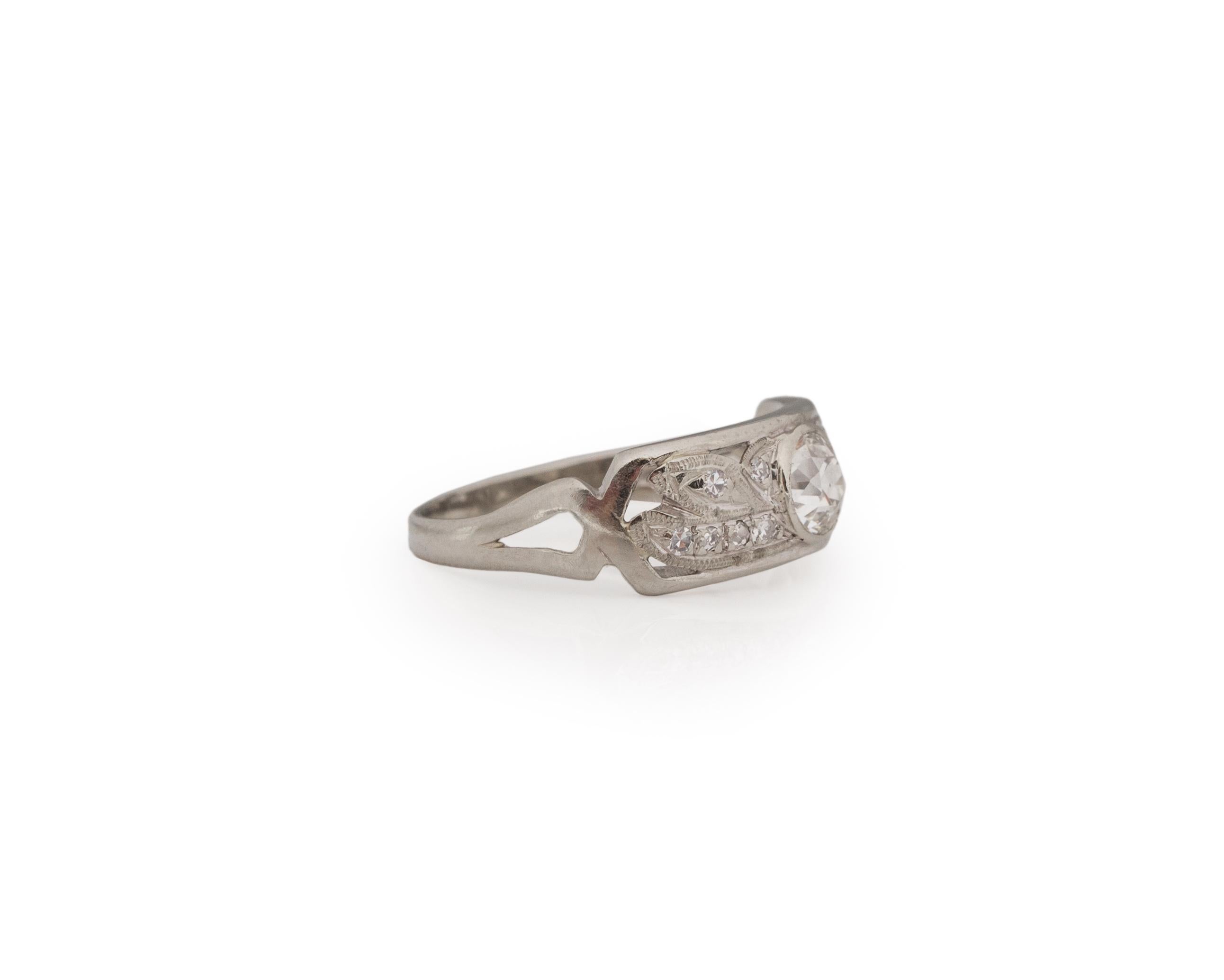 Ring Size: 5.5
Metal Type: Platinum [Hallmarked, and Tested]
Weight: 2.16 grams

Center Diamond Details:
Weight: .40ct
Cut: Old European brilliant
Color: G-H
Clarity: VS

Finger to Top of Stone Measurement: 3mm
Condition: Excellent