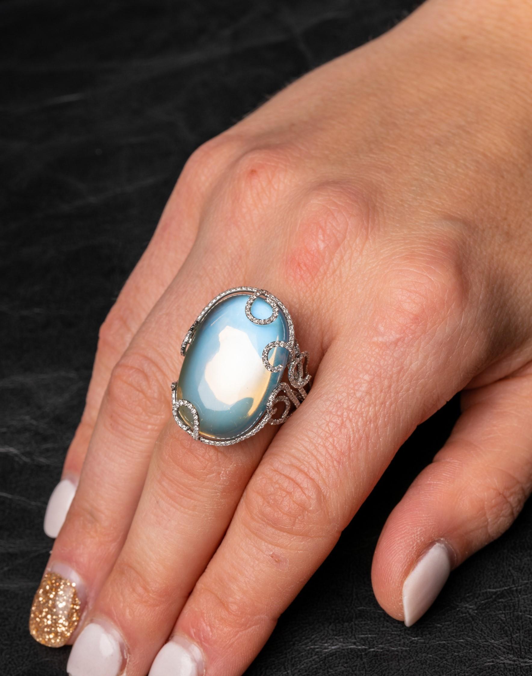 Oval Cut 40 Carat Blue Sheen Moonstone Ring with 1.92 Carat of Diamonds