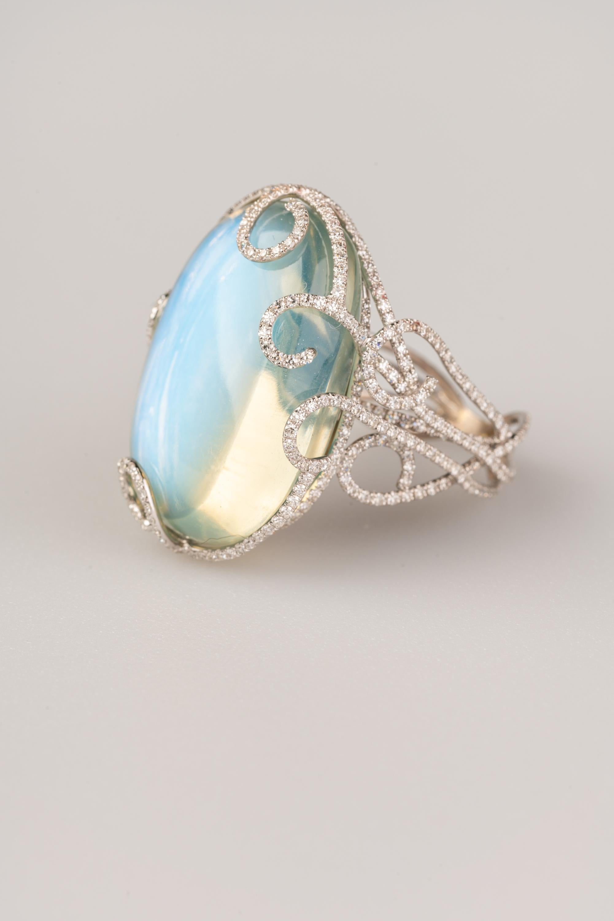 Contemporary 40 Carat Blue Sheen Moonstone Ring with 1.92 Carat of Diamonds