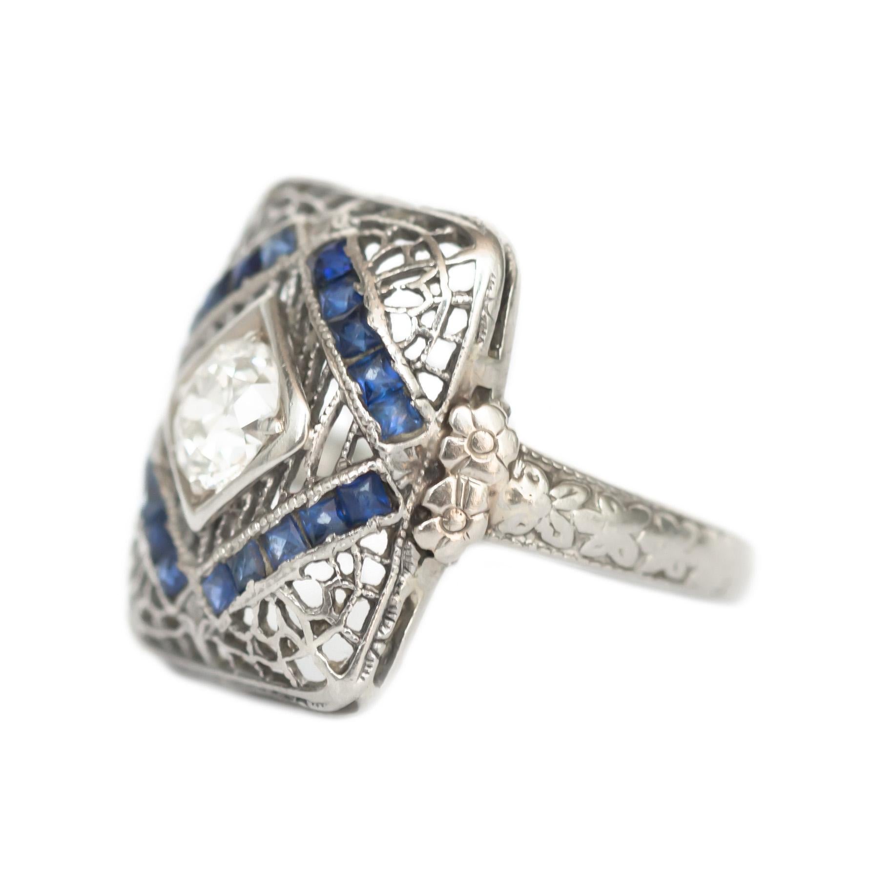 Item Details: 
Ring Size: 2.5
Metal Type: 18 Karat White Gold
Weight: 2.2 grams

Center Diamond Details:
Shape: Old European Brilliant
Carat Weight: .40 carat
Color: H
Clarity: VS1

Color Stone Details: 
Type: Synthetic Sapphire
Shape: French