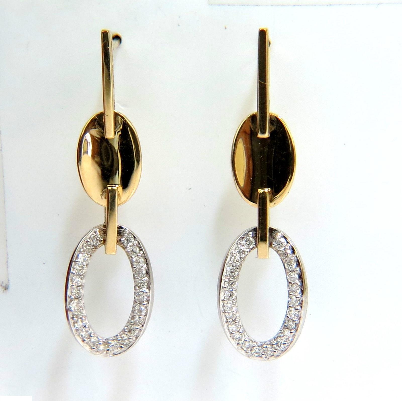 Dangle Perfection!

Two toned. 

.40ct. diamonds

Rounds, full brilliant cuts

Bead set, pave.

Vs-2 clarity.

F-G color. 

14kt. White & Yellow gold.

3.7 Grams.



Overall measurements:

1.3 inch long.

.35 inch wide at Lower Dangle.



Modern
