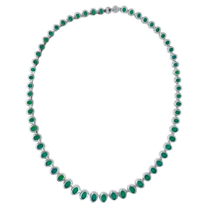 Description

Composed of oval-shaped vivid green emeralds, accented by round brilliant-cut diamonds.

vivid green emeralds weighing a total of 25 carats
Diamonds weighing a total of approximately 15 carats
18 karat white gold

