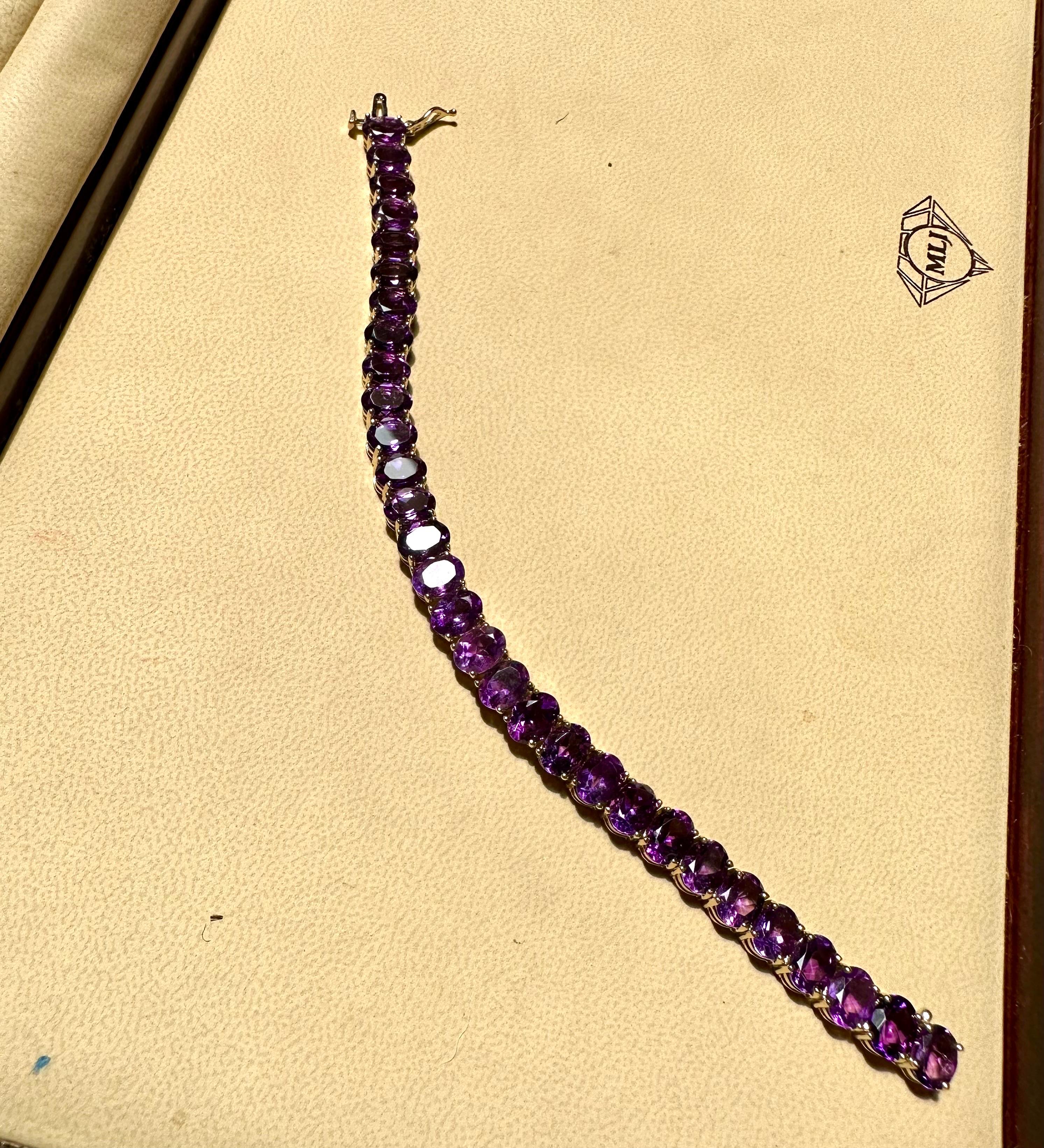 This exceptionally affordable Tennis  bracelet has  40 stones of oval shape Amethyst
Beautiful colors , very Vibrant
Size of the stone is approximately 8X6 mm

Total weight of these Amethyst  is approximately 40 Ct
The bracelet is expertly crafted