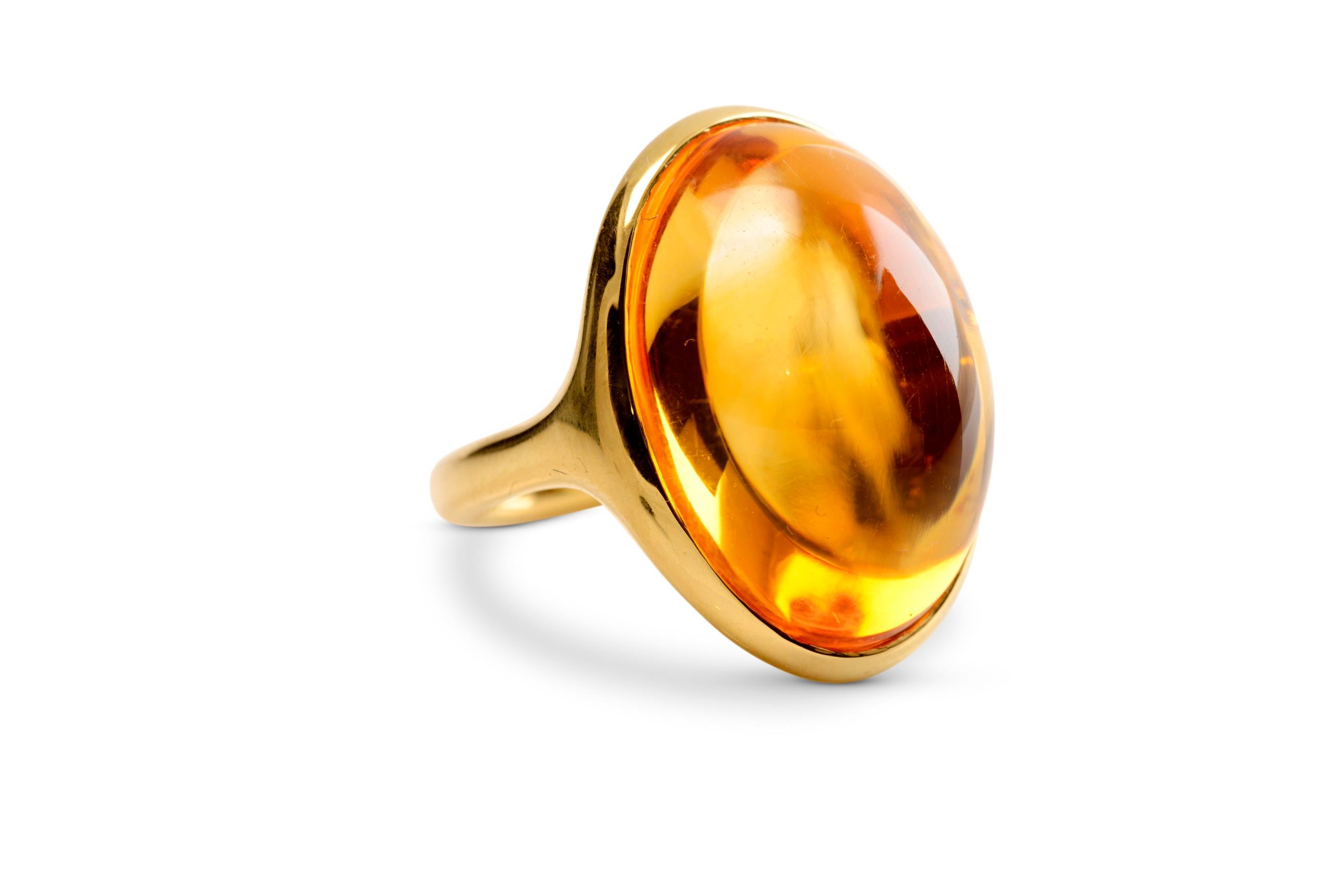 Oval Cut 40 Carat Golden Citrine and 18 Karat Yellow Gold Contemporary Cocktail Ring For Sale