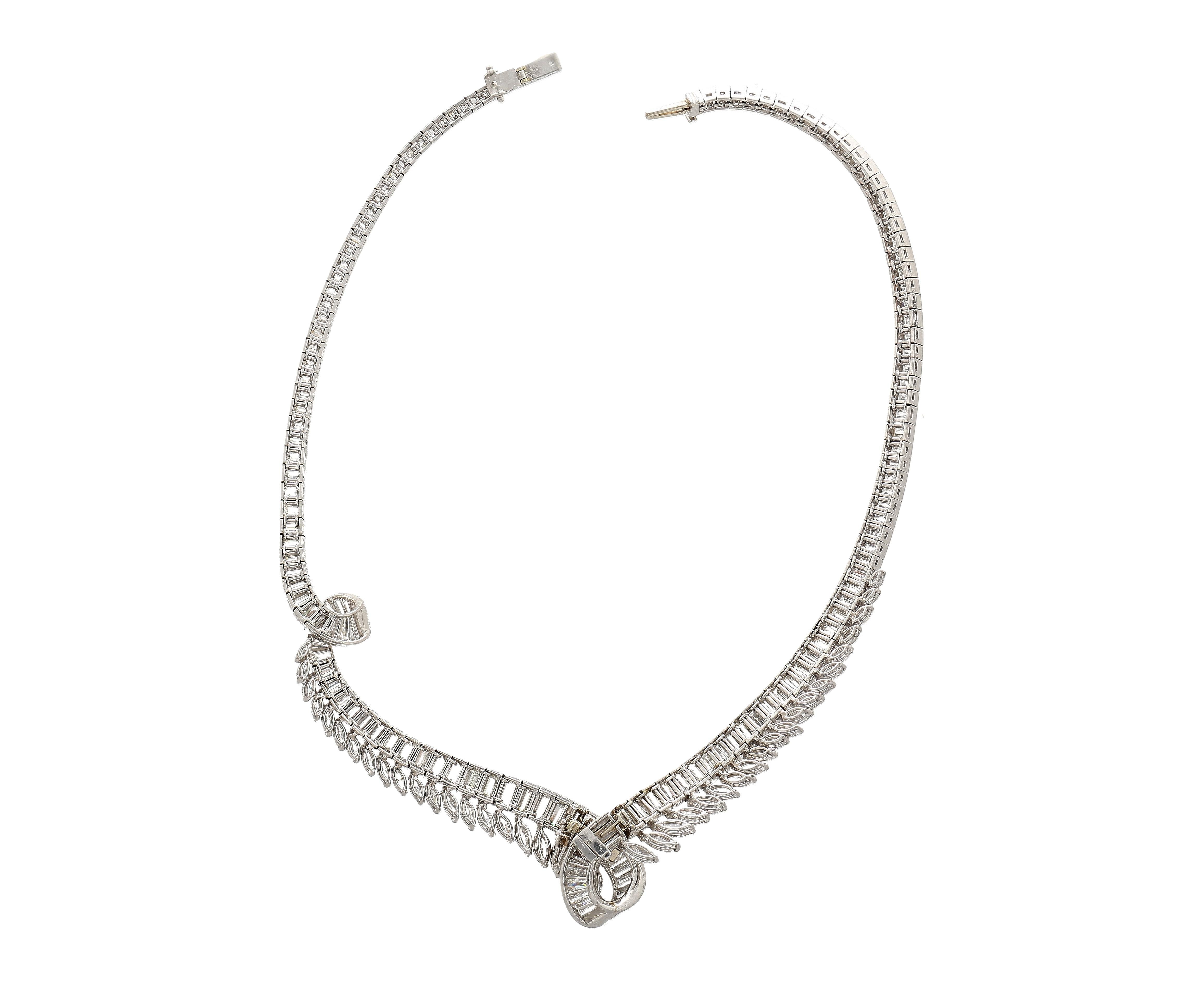 Platinum choker necklace, weighing 75.70 grams and measuring 14 inches. The necklace showcases a total of 193 Diamonds in three different cuts: 41 marquise-cut diamonds, and 152 baguette-cut diamonds. All bearing eye-clean clarity and F-G color. The