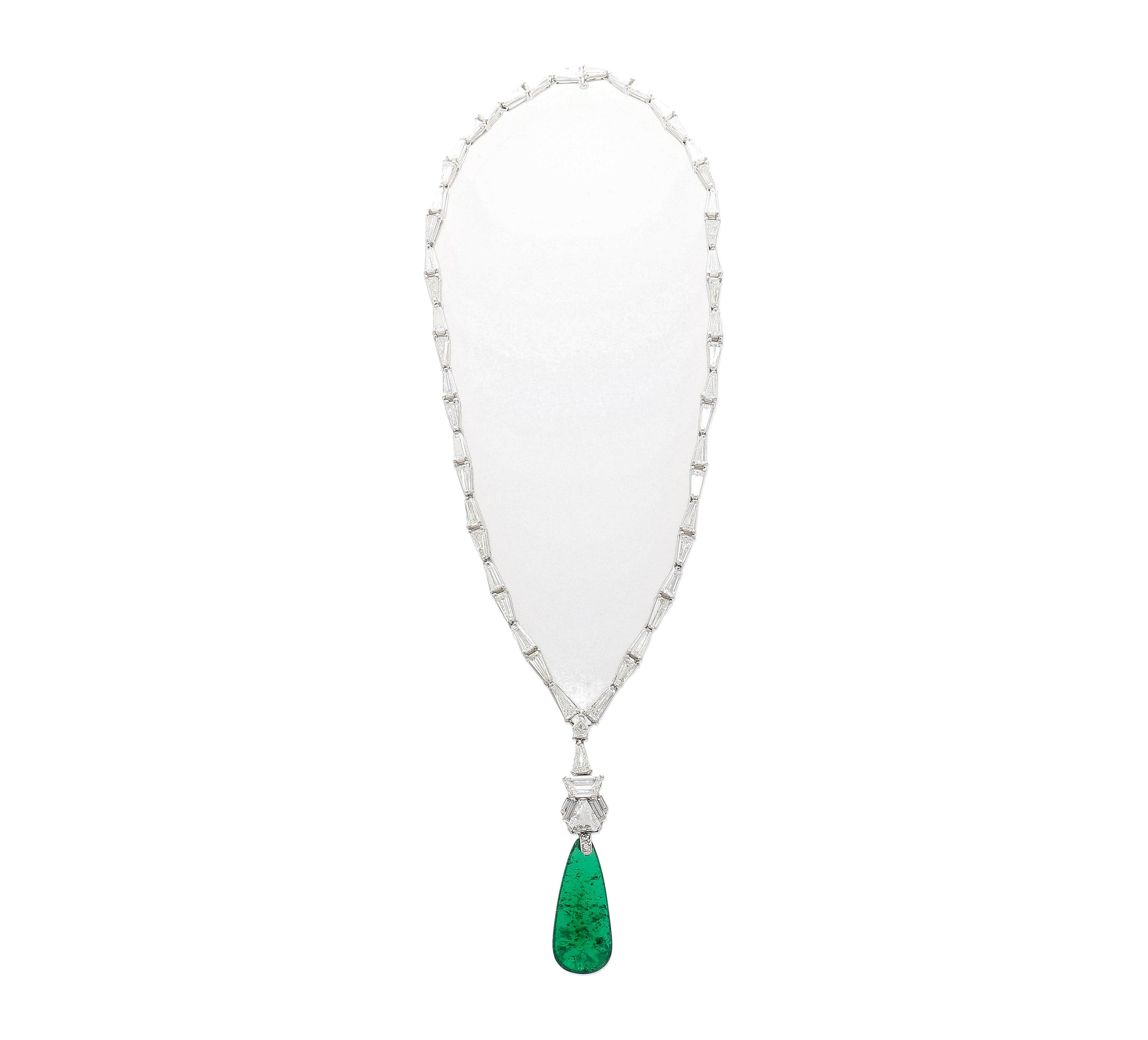 Explore timeless elegance with our 17-carat Colombian Emerald and Diamond Necklace in 18K gold. This exquisite piece showcases a captivating AGL-certified 17.04 carat Old Mine Drilled-Drop-Shape Colombian Emerald with insignificant oil treatment.