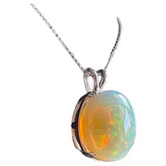 40 Carat Oval Ethiopian Opal Pendant / Necklace 14 Karat Yellow Gold Necklace