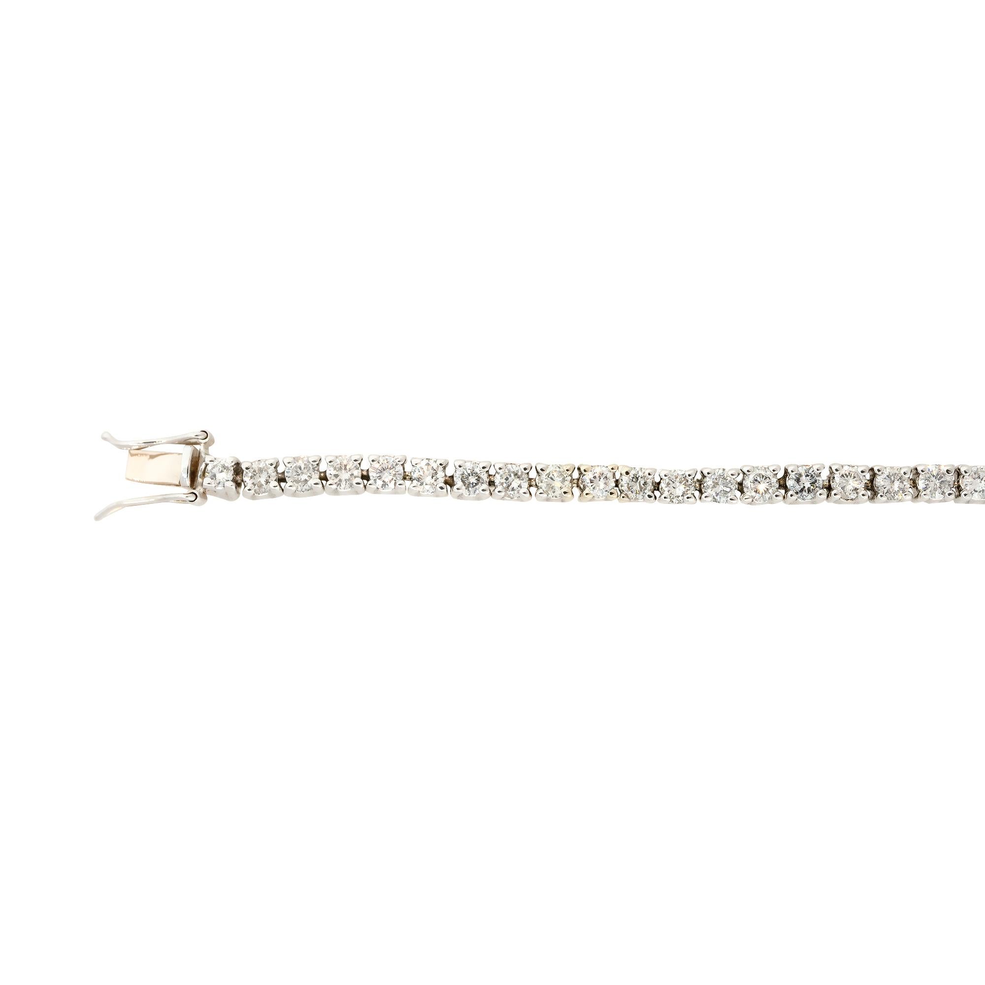 14k White Gold 4.0ctw Round Brilliant Diamond Tennis Bracelet

Style: Women's Diamond Tennis Bracelet
Material: 14k White Gold
Diamond Details: Approximately 4.0ctw of Round Brilliant Cut Diamonds. There are 54 Diamonds total. Diamonds are