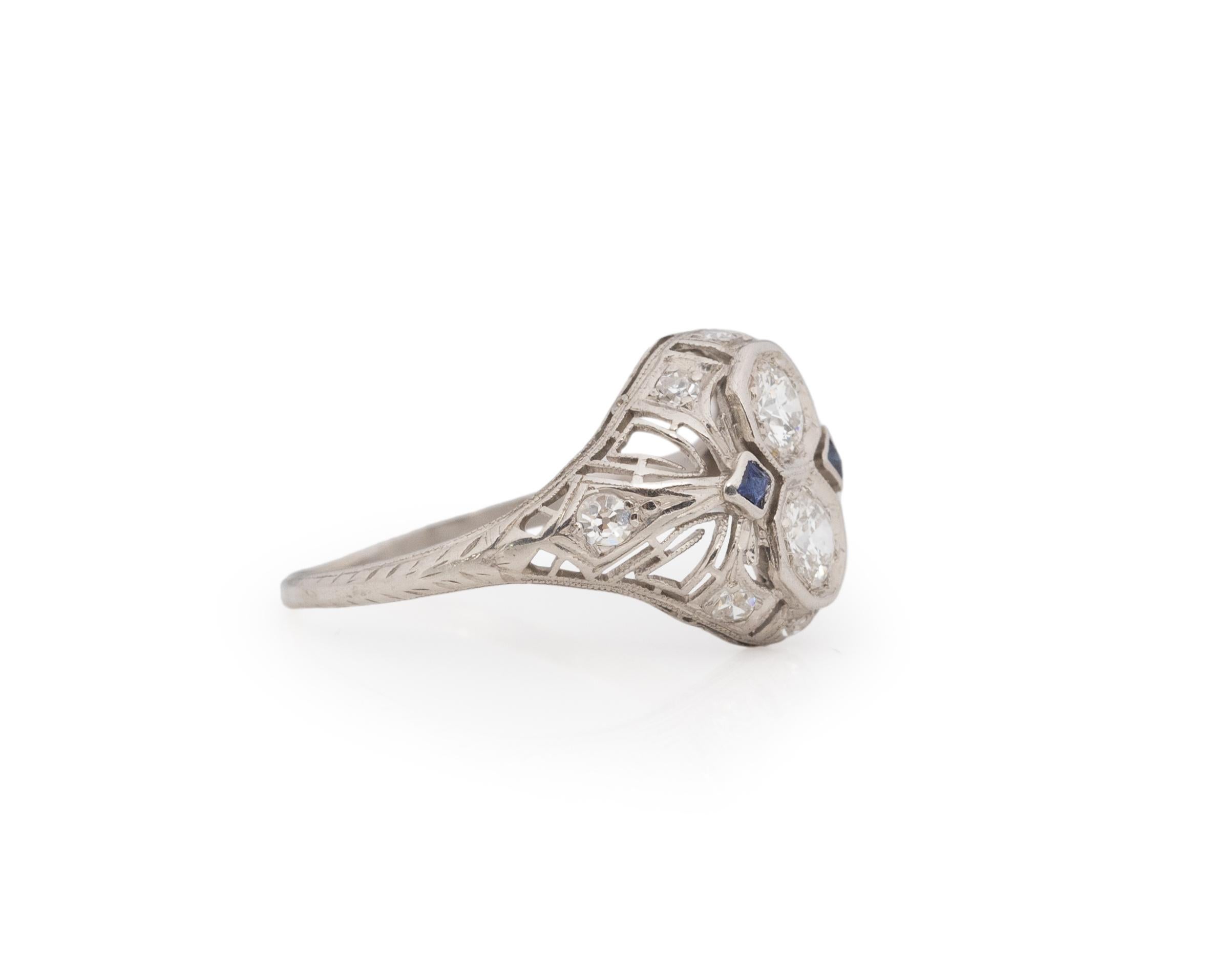 Ring Size: 7.5
Metal Type: Platinum [Hallmarked, and Tested]
Weight: 2.8 grams

Diamond Details:
Weight: .40ct, total weight
Cut: Old European brilliant
Color: G
Clarity: VS

Sapphire Details:
Natural, French Cut

Finger to Top of Stone Measurement: