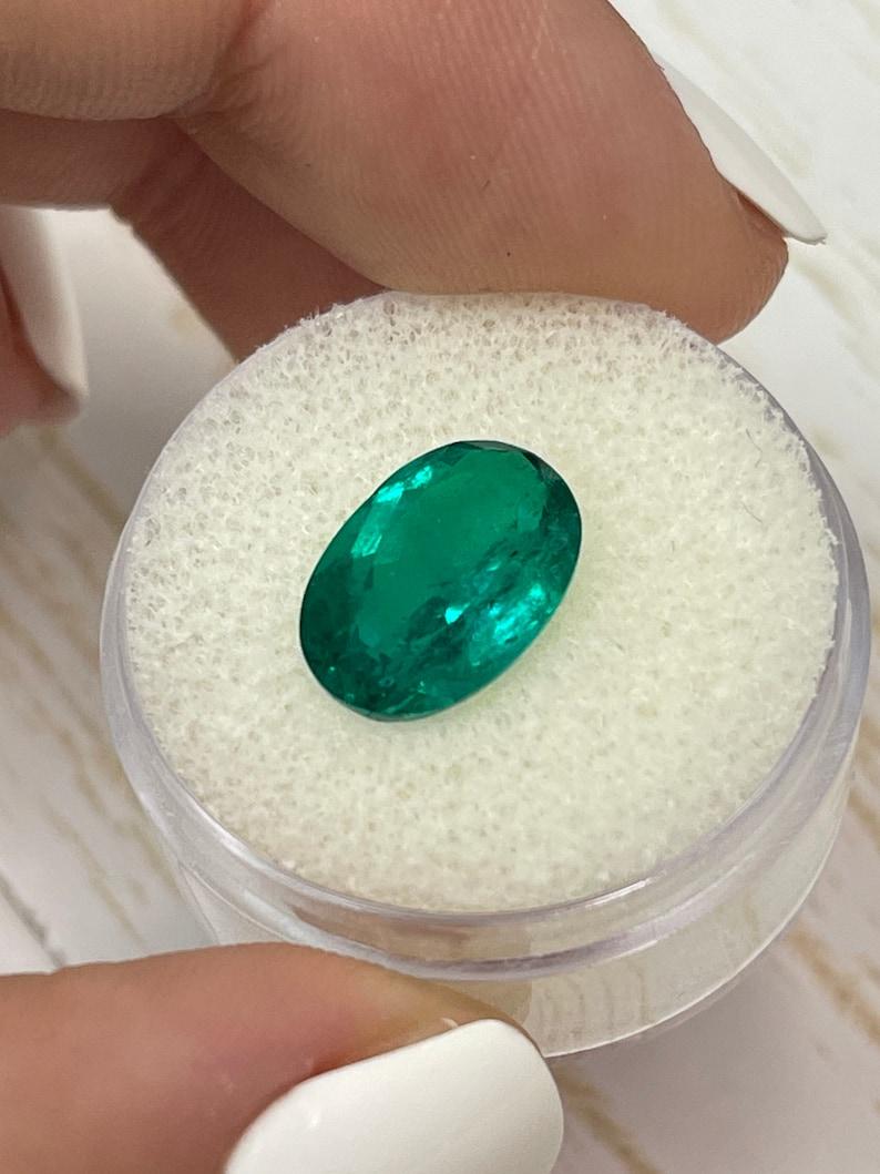 Women's or Men's 4.0 Carat Vivid Dark Muzo Green Colombian Emerald Oval - May Birthstone Gem For Sale