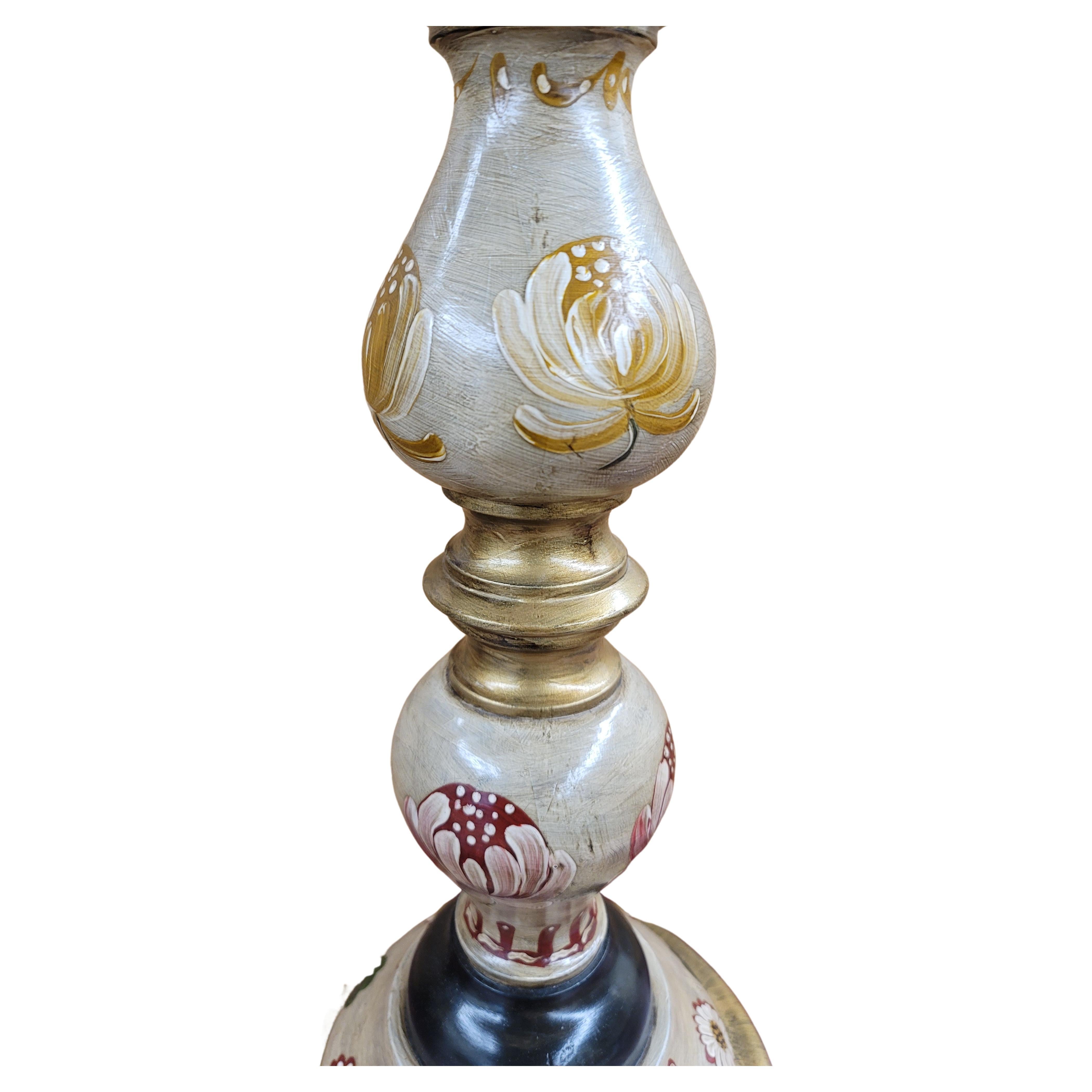 40inches tall German wooden Pillar candlestick originally purchased when exposed at the US Embassy in Germany in 1981. Hand painted and Decorated by Artist Ellen McKibben Johnson in 2004. Painting depicting rose buds, yellow mums, red mums and