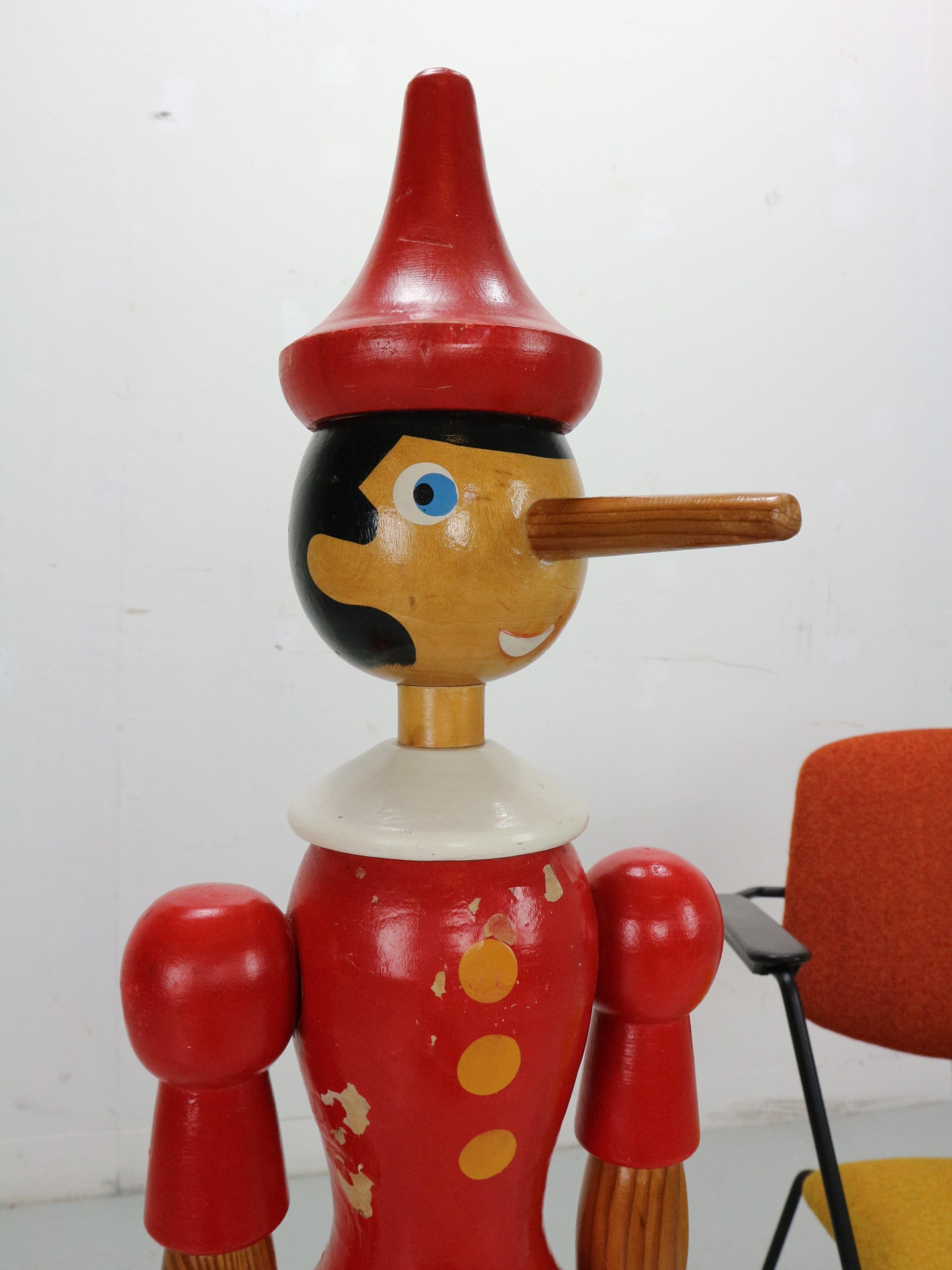 Offering a beautiful, large Pinocchio made of solid wood,

A great 100 cm high and al parts are movable.

He has only suffered a few injuries over the years and created beautiful patina.

He can stand / sit independently and unless there is a pet or