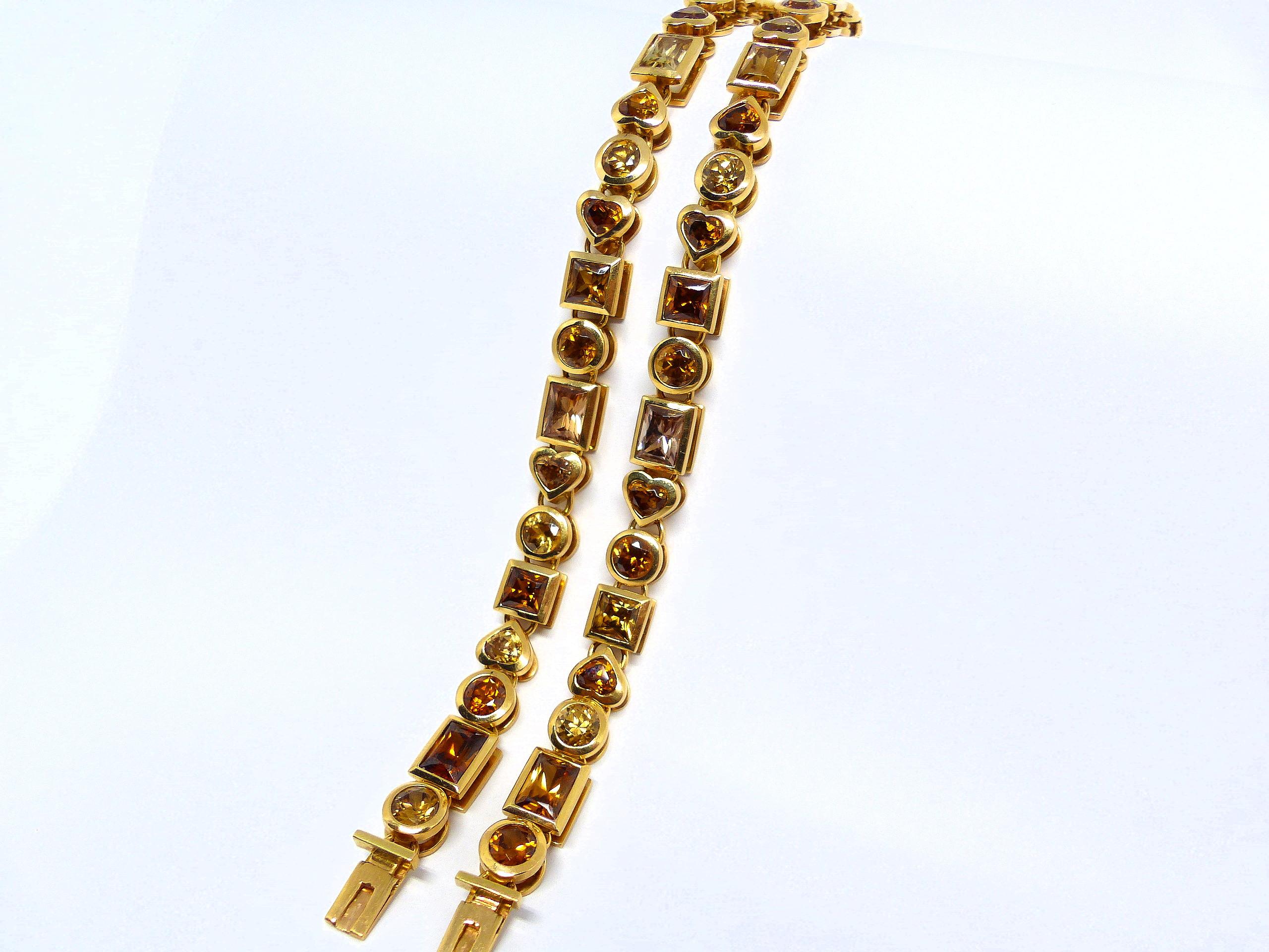 Contemporary Bracelet in Rose Gold with 2 rows with 40 Brown Zirkons in Various Shapes. For Sale