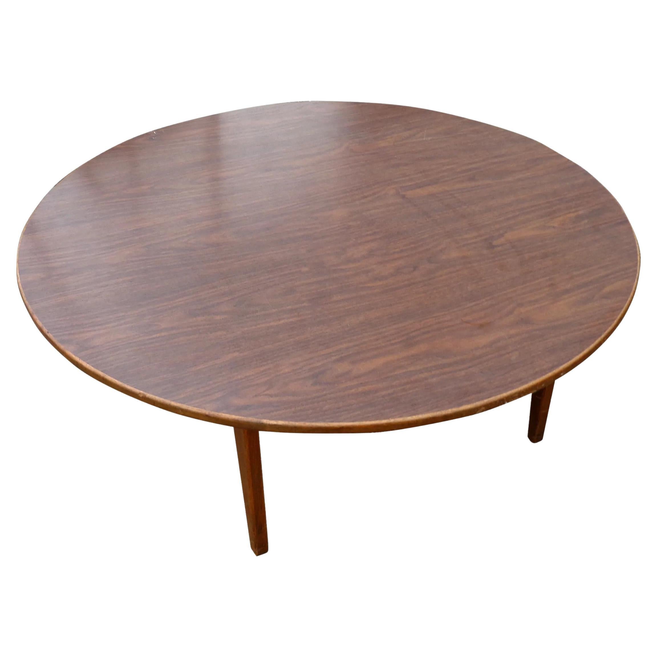 40? Mid-century Jen Rison walnut coffee table.


Jens Risom coffee table in walnut laminate. Round top with square sculptural base. Original Jens Risom Design Inc. label on bottom.