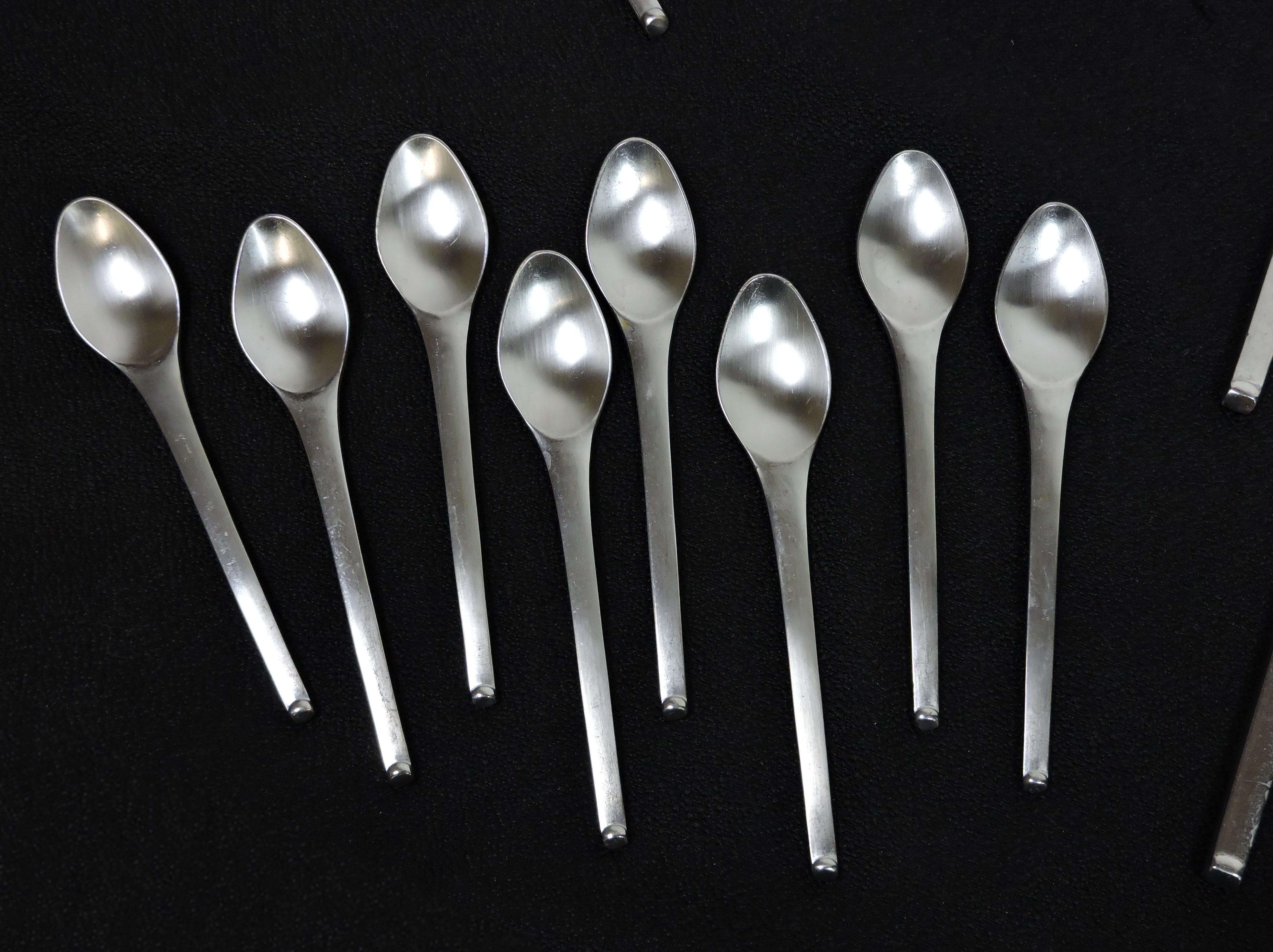 Beautiful 40 piece, service for eight, set of Stanley Roberts flatware service in the Contempra pattern. This set consists of 8 forks, 8 salad forks, 8 soup spoons, 8 teaspoons, and 8 knives. Heavy and well made, these have a great modernist look.