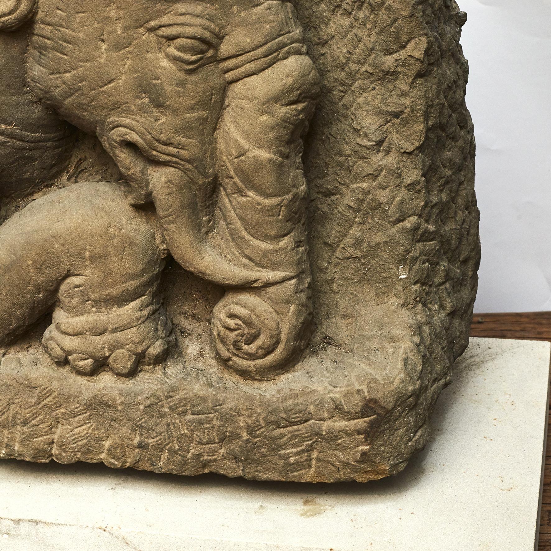 400-500 old Burmese sandstone elephant with beautifully detailed carvings.
Very decorative with natural patina. Forehead with older repair
From pagoda / temple in Burma (Myanmar), Arakan.

Provenance: From private collection, Denmark.