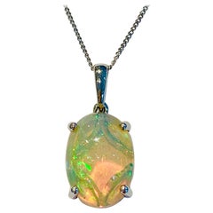 4.00 Carat AAAA Oval Welo Opal Pendant in Platinum with Platinum Chain