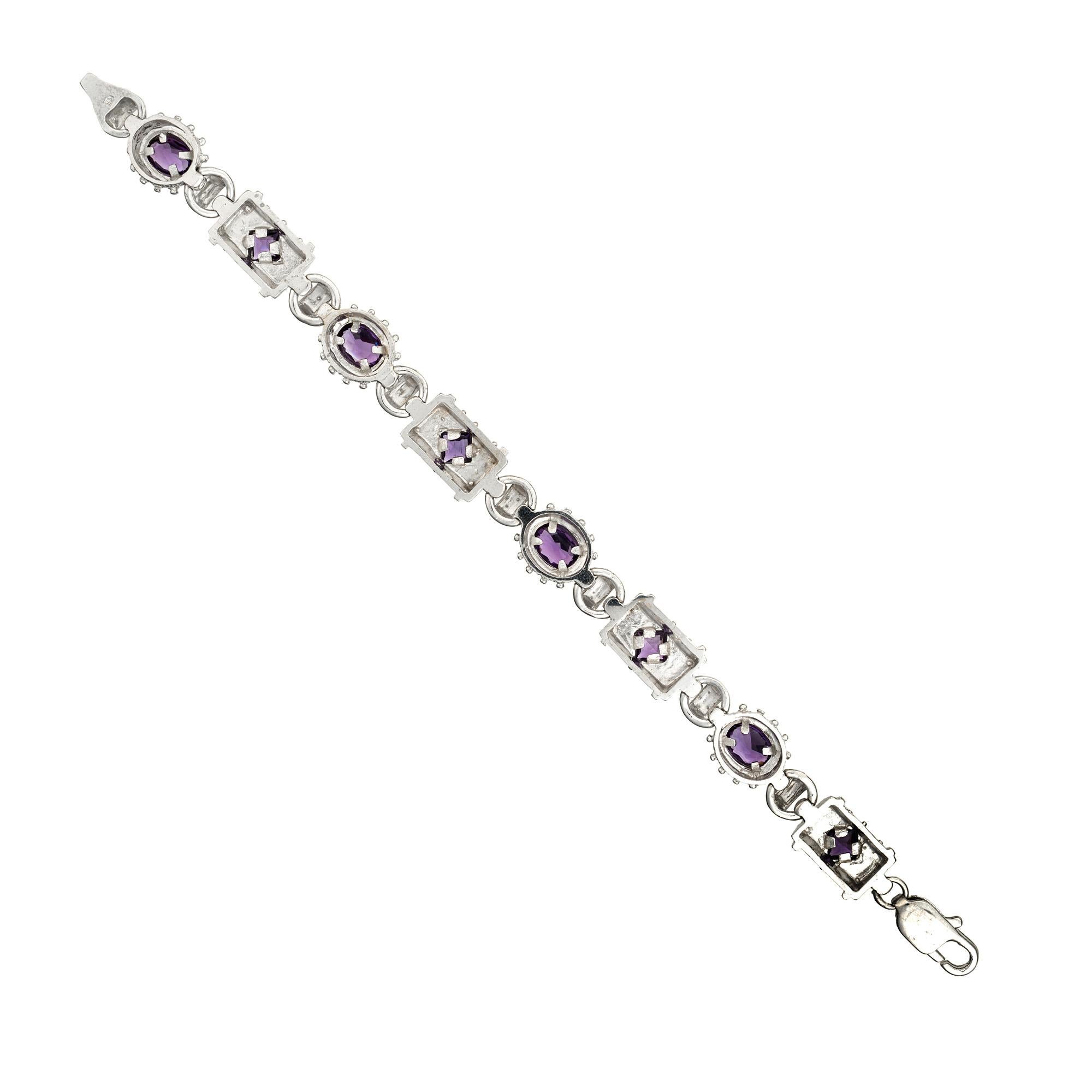 Dive into the timeless elegance of our 4.00ct Amethyst and 14k white gold byzantine 7 inch link bracelet, where classic design meets modern sophistication. Each square and oval amethyst stone, resplendent in its royal purple hue, is seamlessly