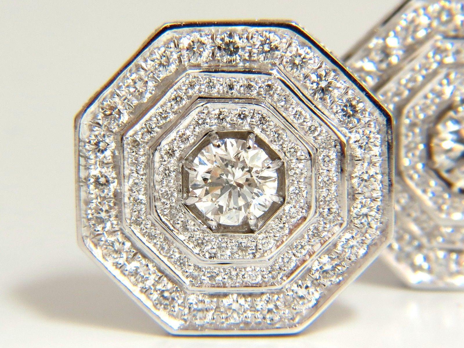 Bead set / Architectural Mod Deco / Octagonal Raised Step /  Omega Clip Earrings

4.00ct. Full cut Rounds, brilliant natural diamonds

Sifted from the finest diamond parcels.

Vs-2  clarity

F / G -colors.

18kt. white gold. 

Diameter: .71