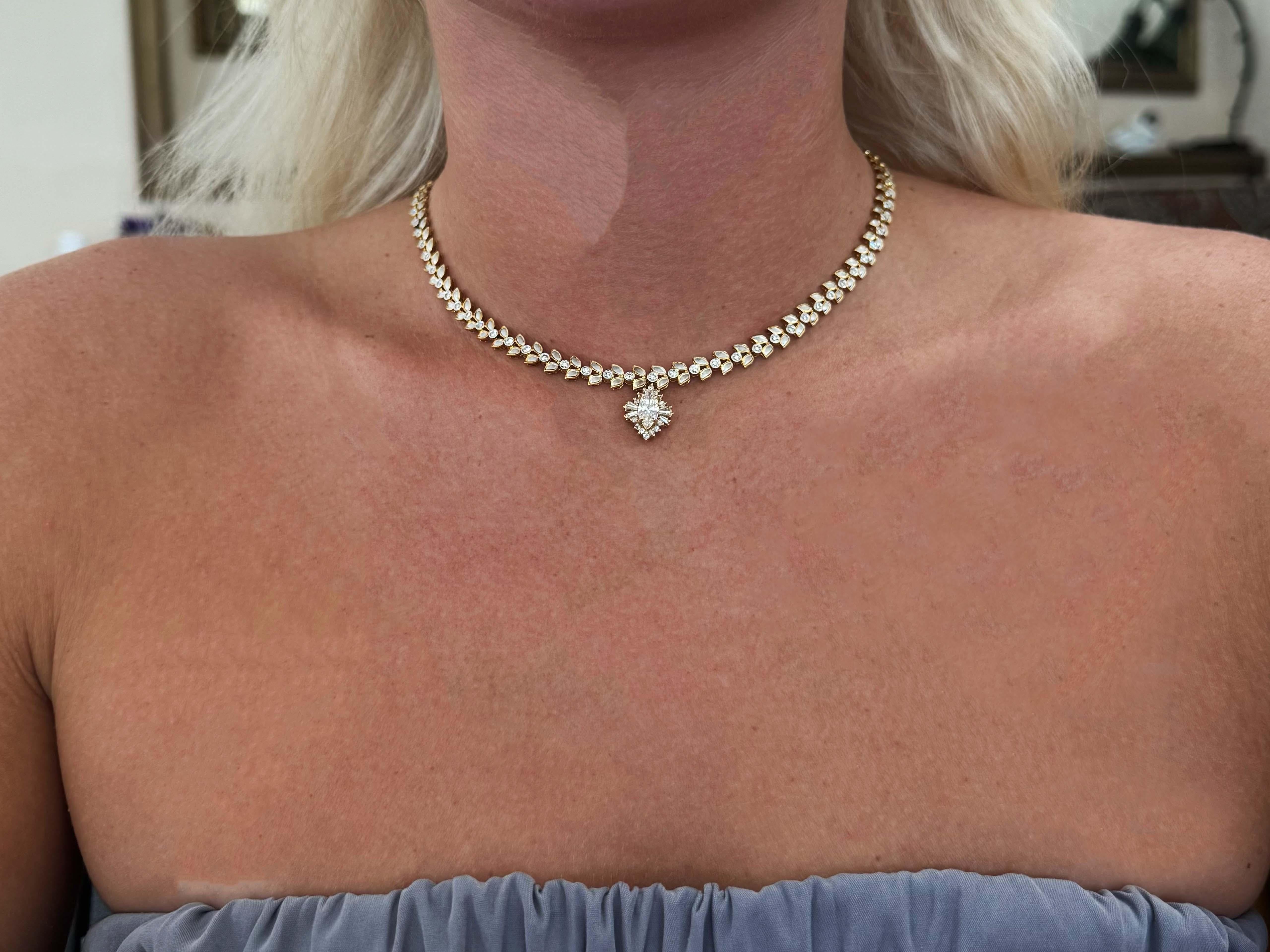 Item Specifications:

Necklace Metal: 18k Yellow Gold

Total Weight: 28.1 Grams

Chain Length: 16