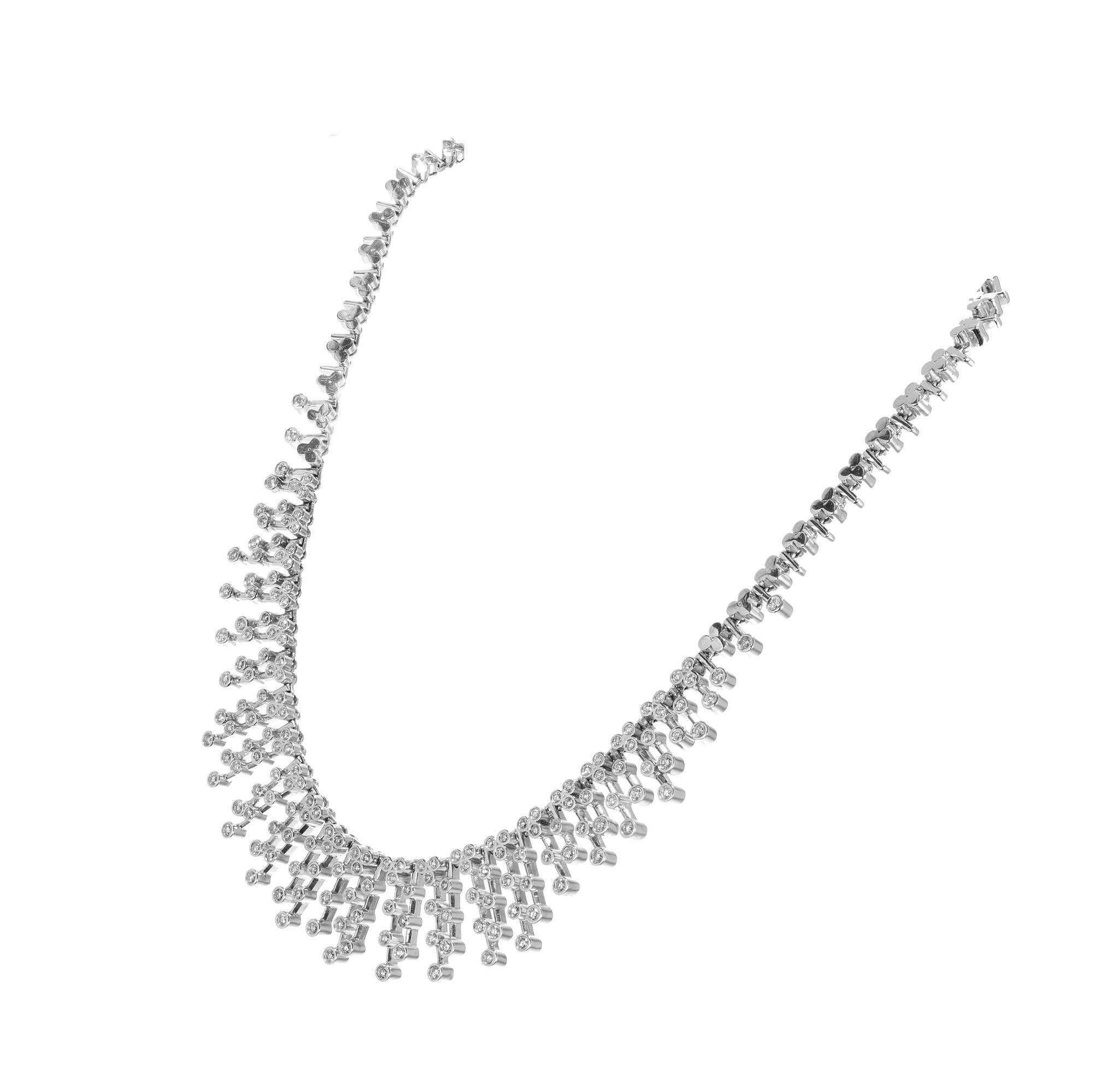 4.00 carat diamond Cleopatra graduated style necklace in 18k white gold  

175 round brilliant cut diamonds G SI, approx. 4.00cts
18k white gold 
Stamped: 750
75.1 grams
Width at top: 5.15mm by clasp
Height at top: 3.6mm
Width at bottom: 19.5mm