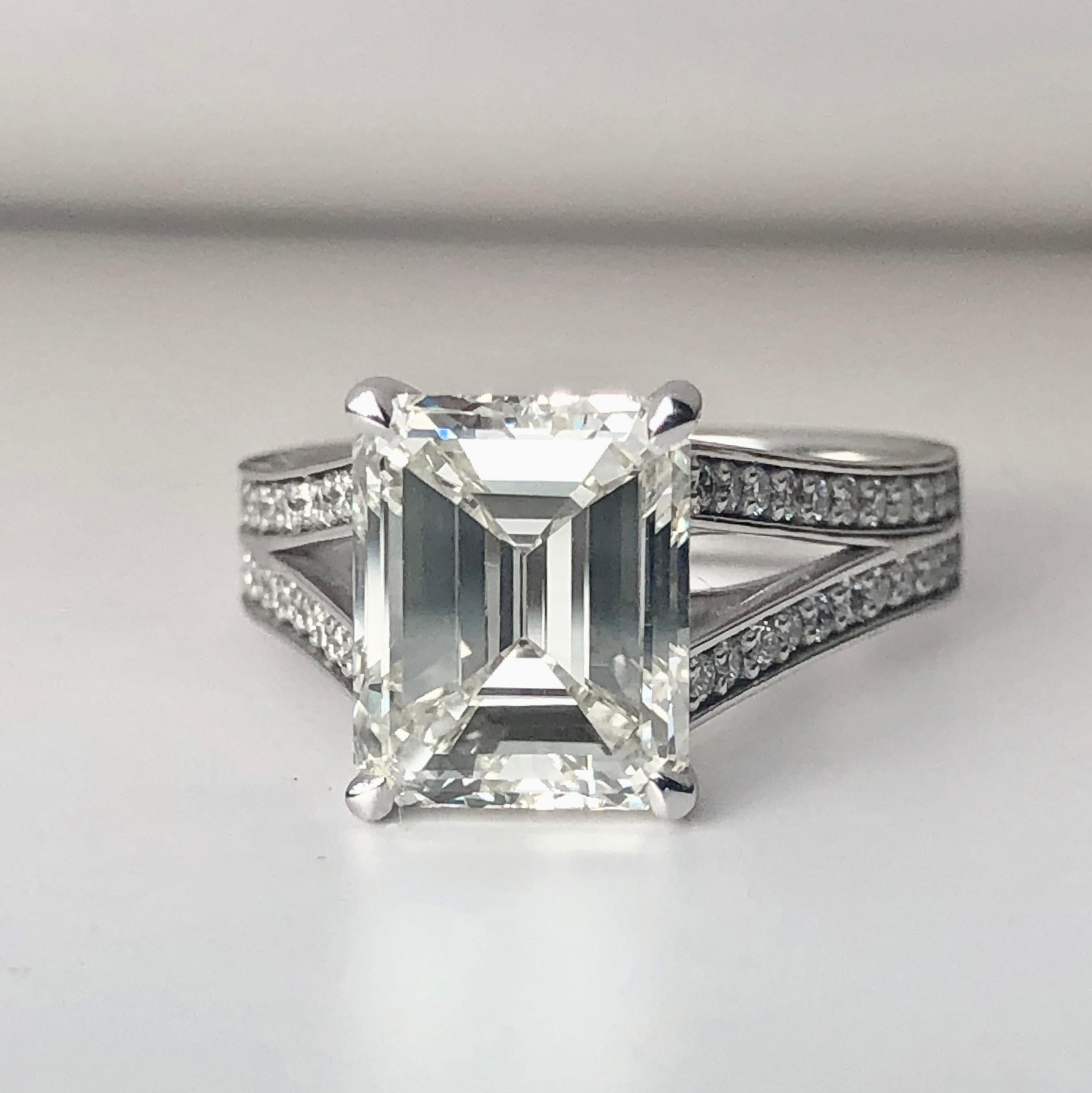 Emerald Cut Diamond Ring

3.75ct Principal Diamond J Colour VS Clarity - EGL Certificate 

18K White Gold Mount With Phoenix Talon Claws And Diamond Set Bifurcated Split Shank 

This Piece Is Newly Constructed And Is A Size M - This Can Be Altered