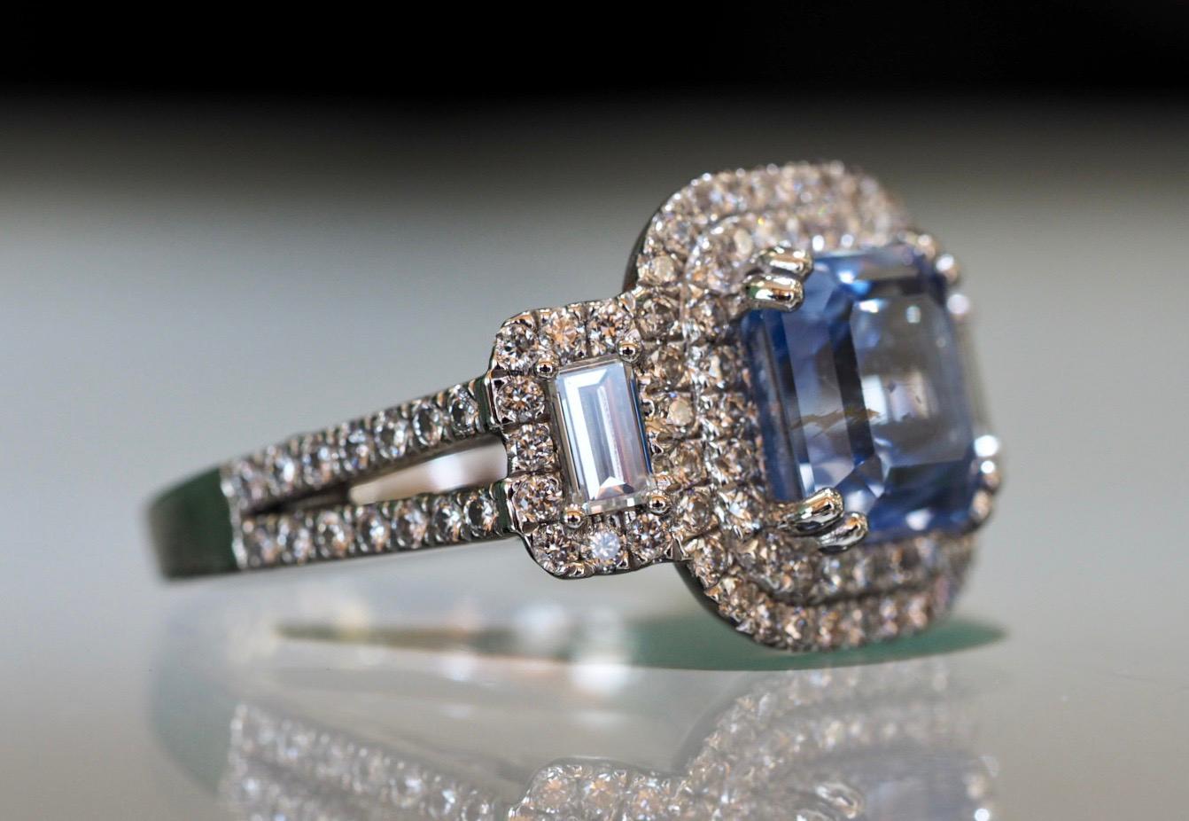 Brand new sapphire and diamond platinum ring has been custom designed and created to perfection by our magnificent team! It includes a 4.00 carat  octagonal step-cut natural 