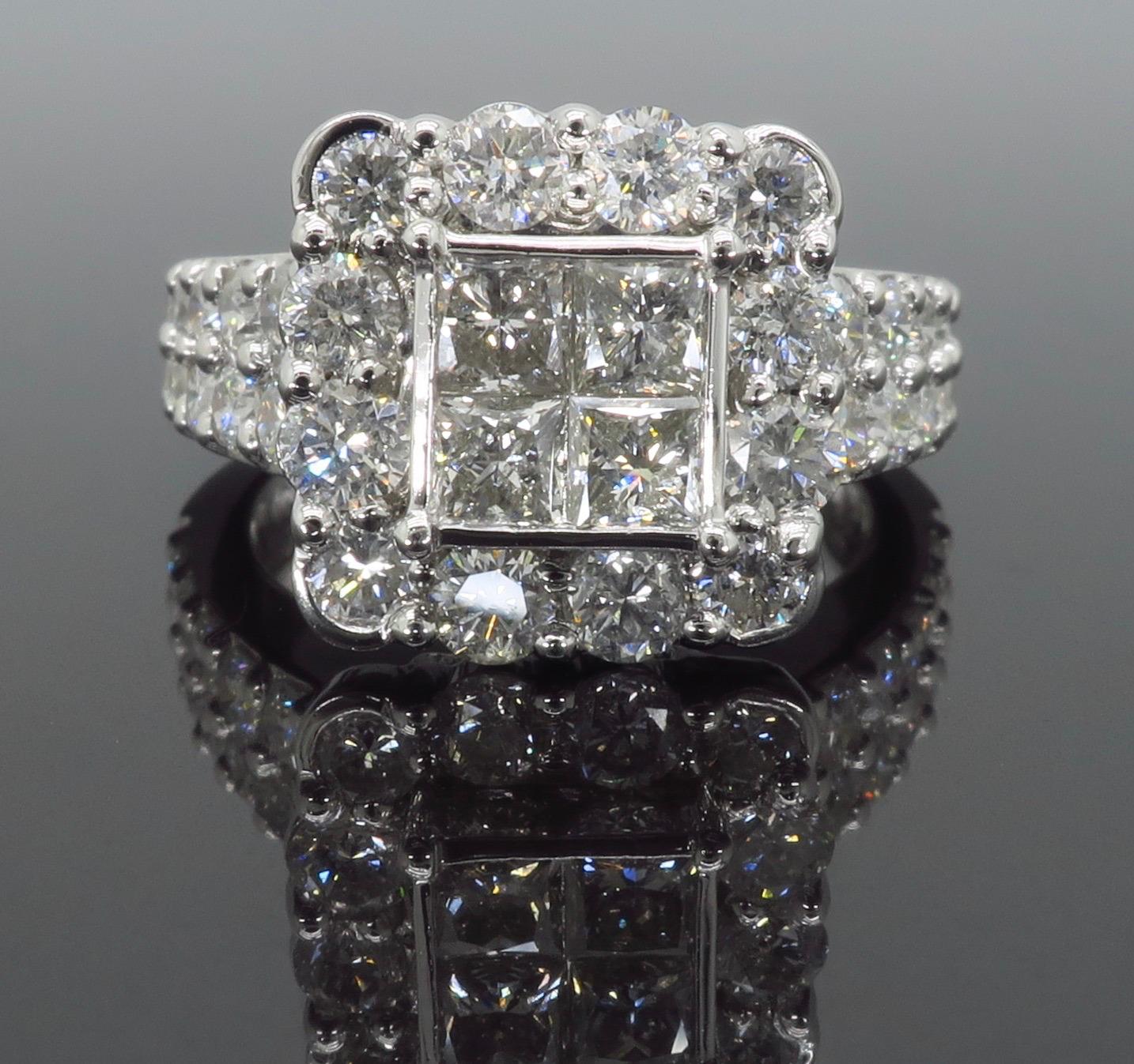 quad diamond engagement ring