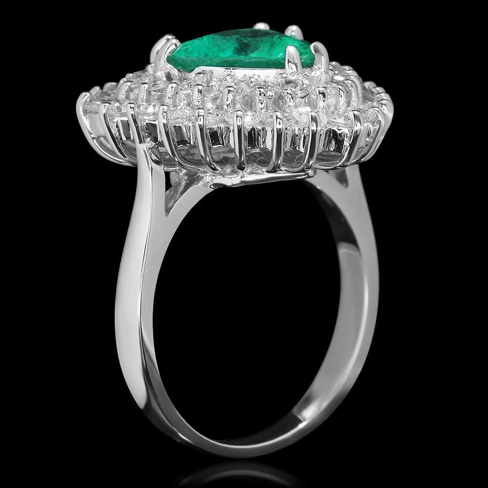 4.00 Carats Emerald and Diamond 14K Solid White Gold Ring

Total Emerald Weight is: Approx. 2.40 Carats 

Emerald Measures: Approx. 11.00 x 9.00mm

Natural Round Diamonds Weight: Approx. 1.60 Carats (color G-H / Clarity SI1-SI2)

Ring size: 7 (free