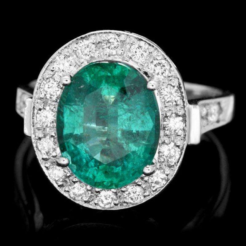 4.00 Carats Emerald and Diamond 14K Solid White Gold Ring

Total Emerald Weight is: Approx. 3.40 Carats 

Emerald Measures: Approx. 11.00 x 8.00mm

Natural Round Diamonds Weight: Approx. 0.60 Carats (color G-H / Clarity SI1-SI2)

Ring size: 7 (free