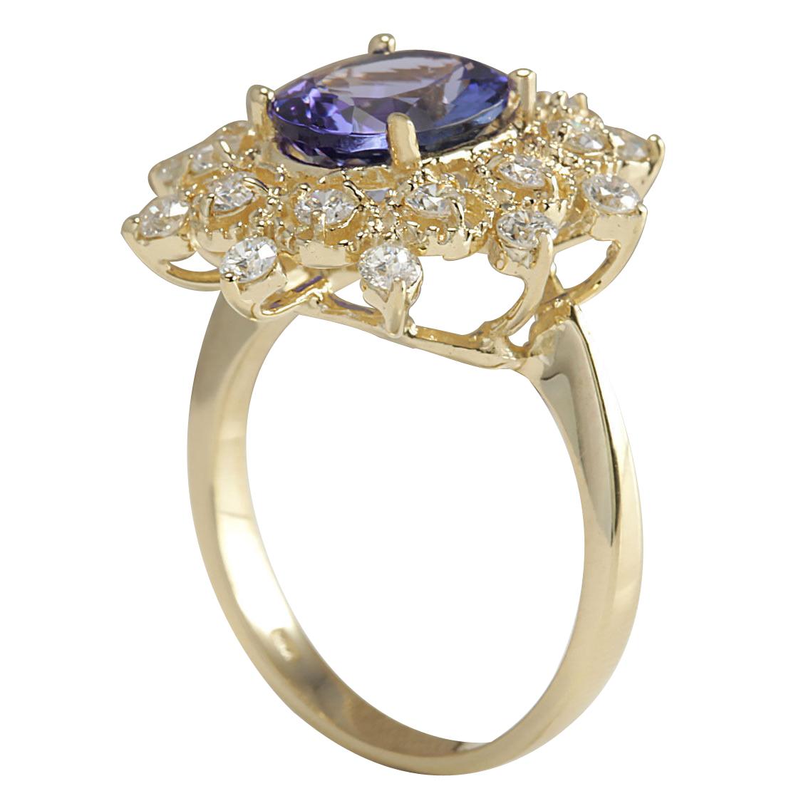 Oval Cut Tanzanite Diamond Ring In 14 Karat Yellow Gold  For Sale