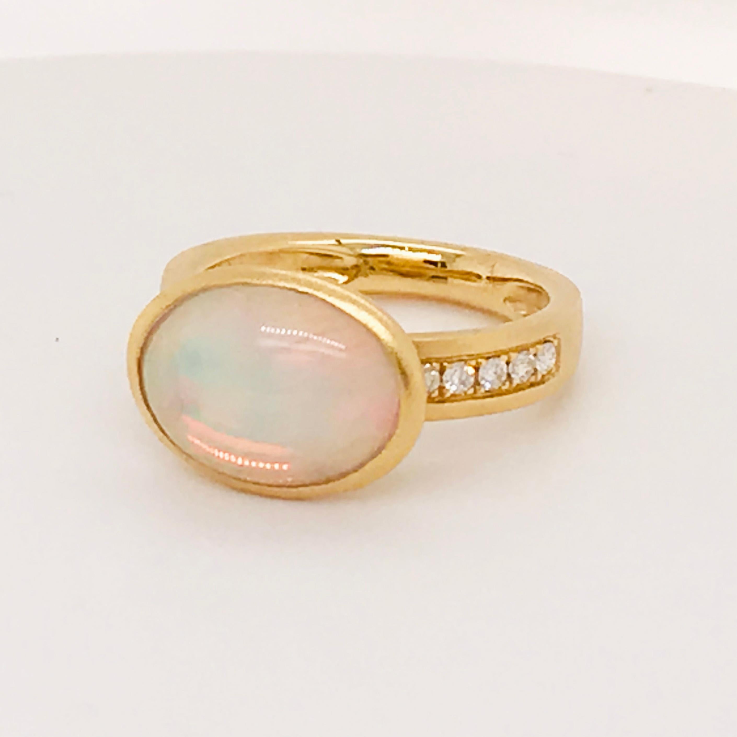 Women's 4.00 Carat Opal and 1/5 Carat Diamond Ring in Brushed 14 Karat Yellow Gold For Sale