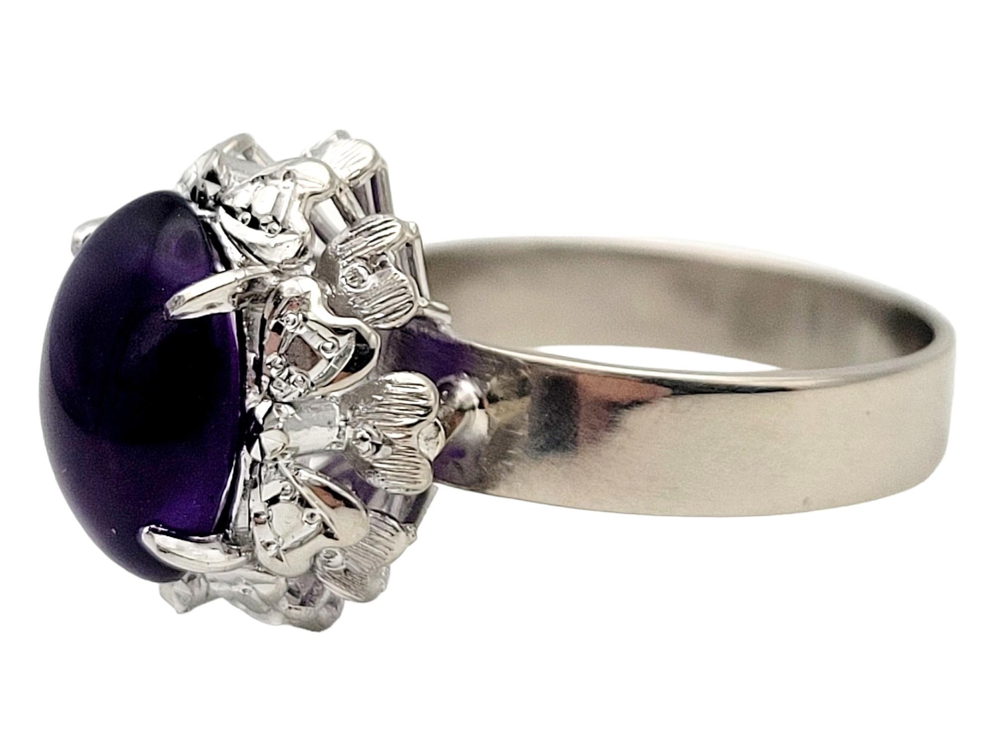 Ring Size 6.75 

Indulge in the timeless allure of this stunning cabochon amethyst solitaire cocktail ring. Elegantly designed, this incredible 10 karat white gold ring showcases a high profile 4.00 carat oval cabochon amethyst gemstone that