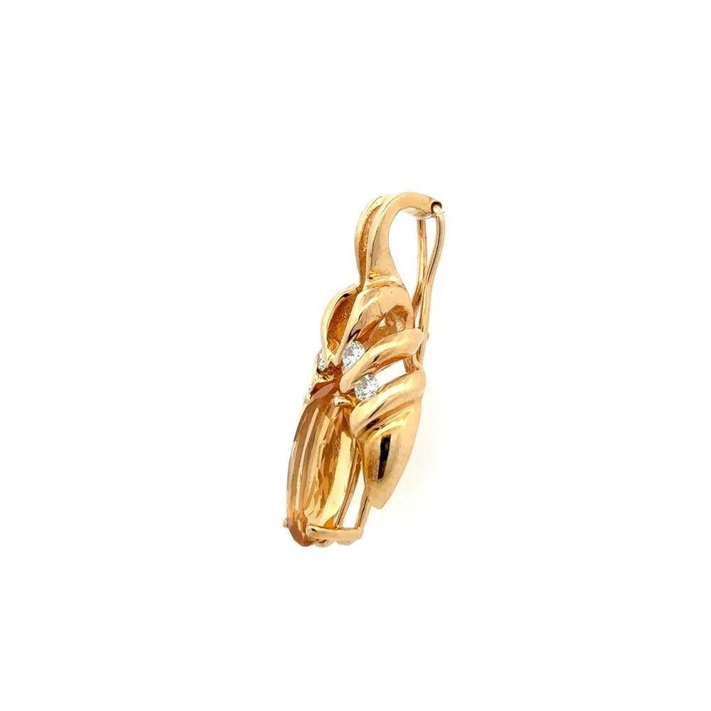 Simply Beautiful! Finely detailed Oval Citrine and Diamond Gold Statement Enhancer Pendant. Featuring a securely Hand set 4 Carat Oval Citrine. Enhanced with Round Brilliant Cut Diamonds, weighing approx. 0.28tcw. Artfully Hand crafted 14K Yellow