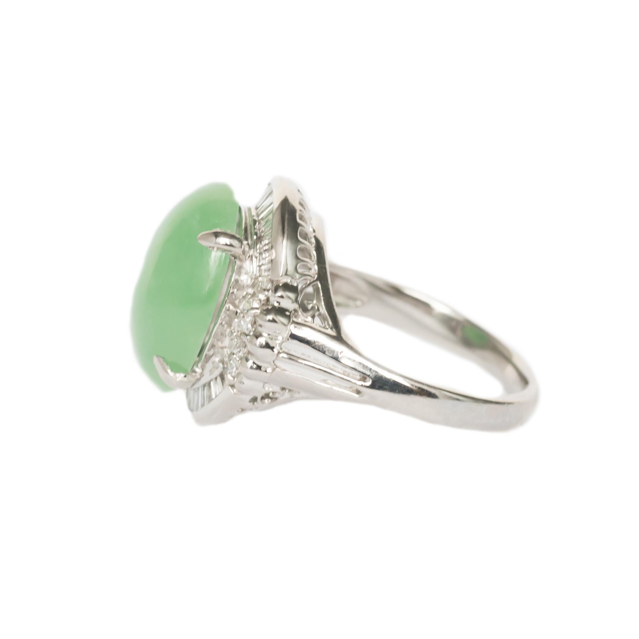 
Item Details: 
Ring Size: 4.90
Metal Type: Platinum
Weight: 7.4 grams

Center Diamond Details
Shape: Oval Cabochon
Carat Weight: 4.00 Carat
Color: Light green-medium green color
Clarity: VS Clarity

Side Stone Details: 
Shape: Round and