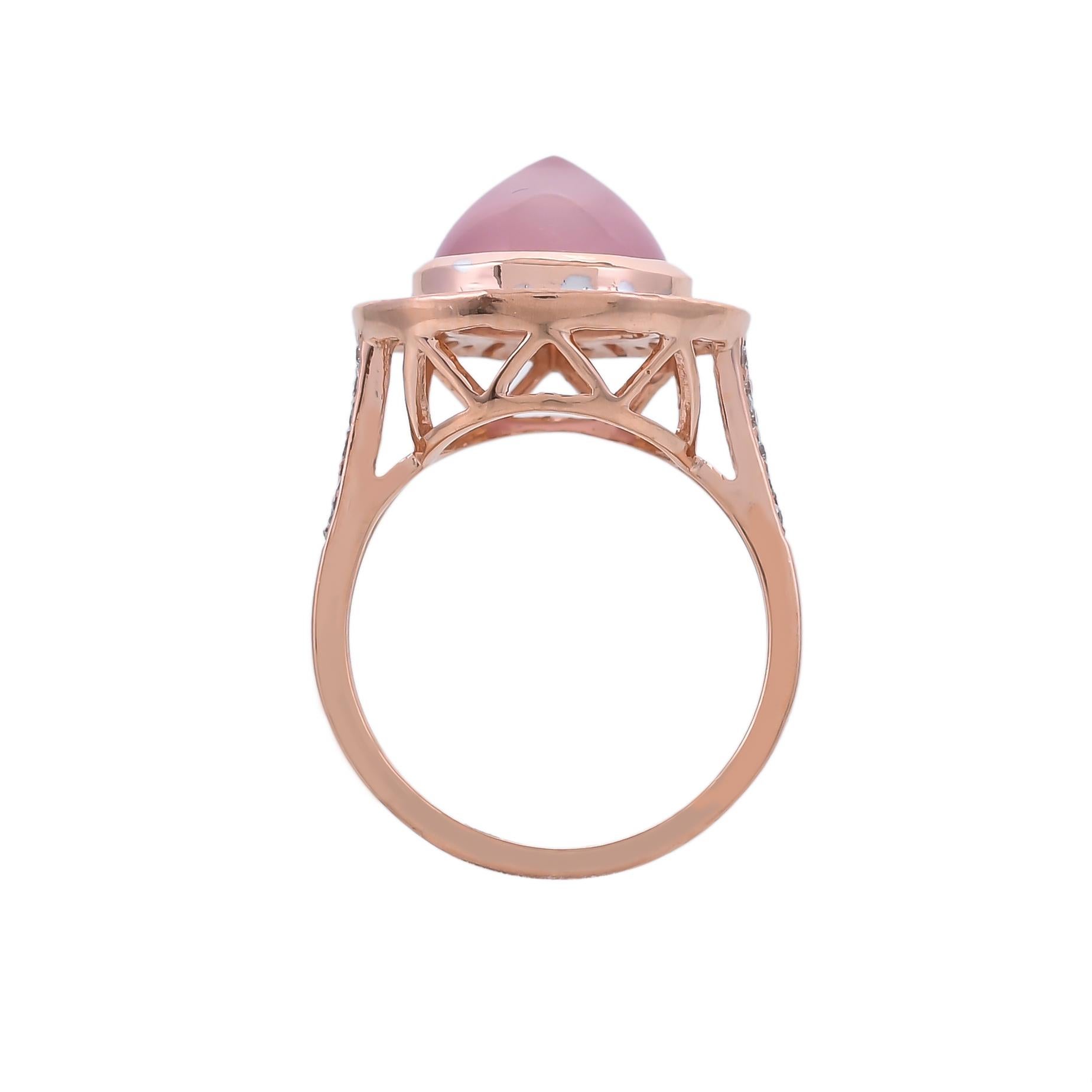 This 18 karats classic yellow gold ring from the collection Bon Bon is set meticulously with 0.25 carats diamonds and 4.00 carats rose quartz.
Playful yet chic this ring is an answer to spice up your everyday style.
Ring Size- US 6.5
Top