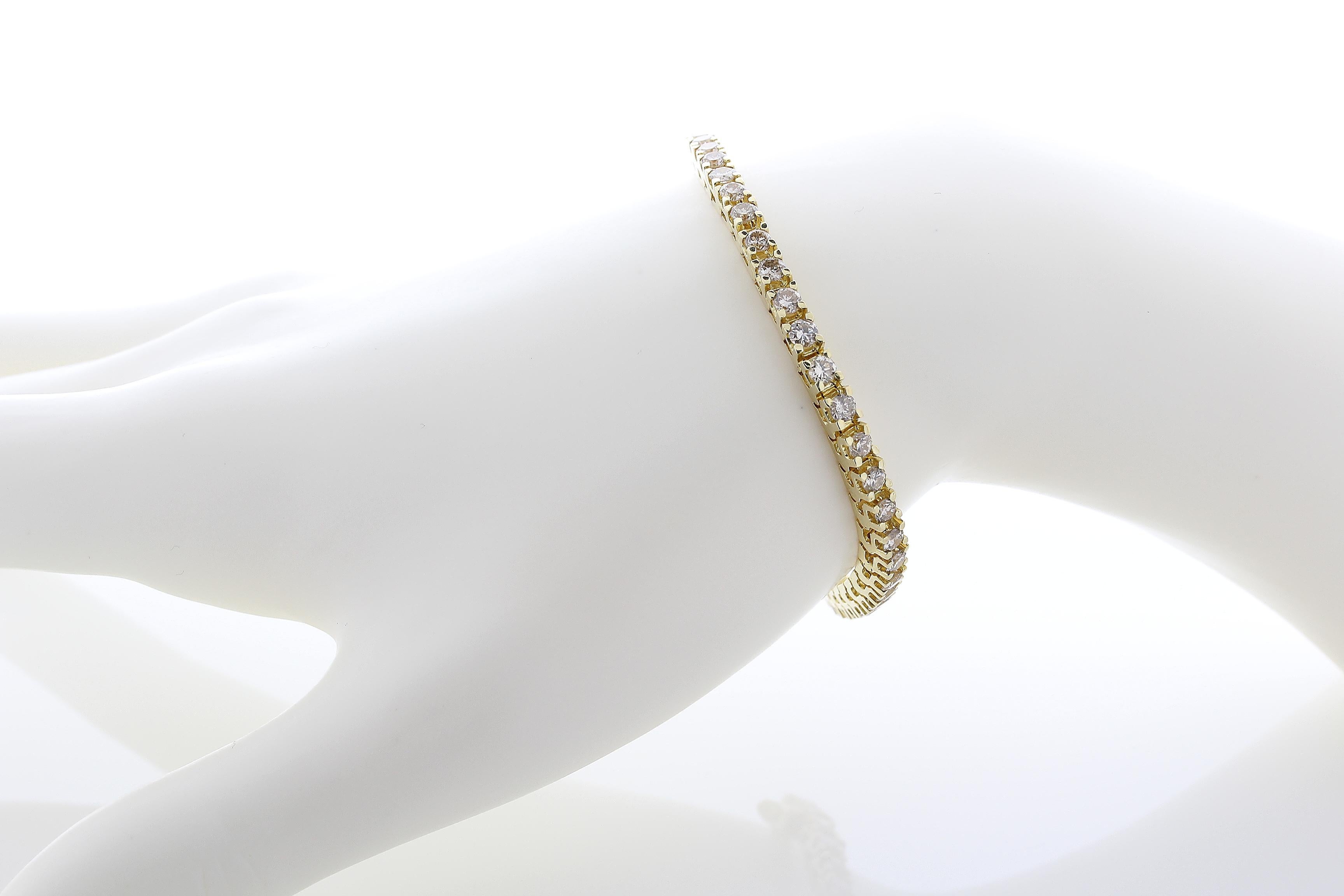 Incredible Deal on 4.00 Carat Total Weight Round Brilliant Shape Diamond Tennis Bracelet, 
This beautiful Natural Diamonds Tennis Bracelet is set in a 14 Karat Yellow Gold Mounting.
The bracelet holds 50 natural round diamonds in a prong setting,